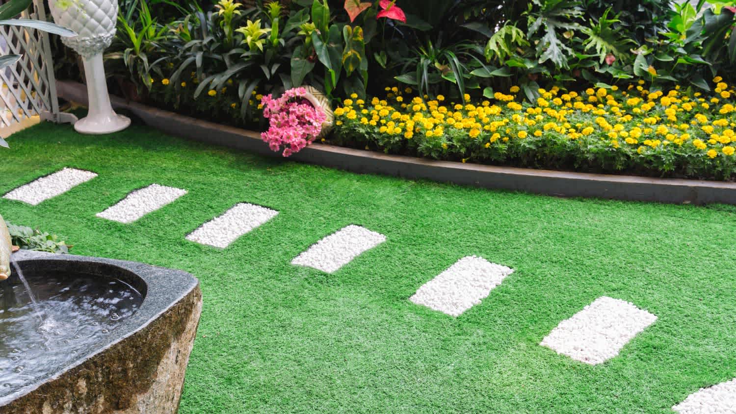 A path in a garden with artificial grass