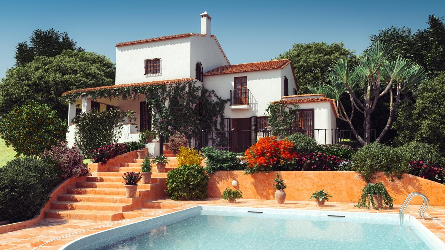 The exterior of a Mediterranean style house with a pool