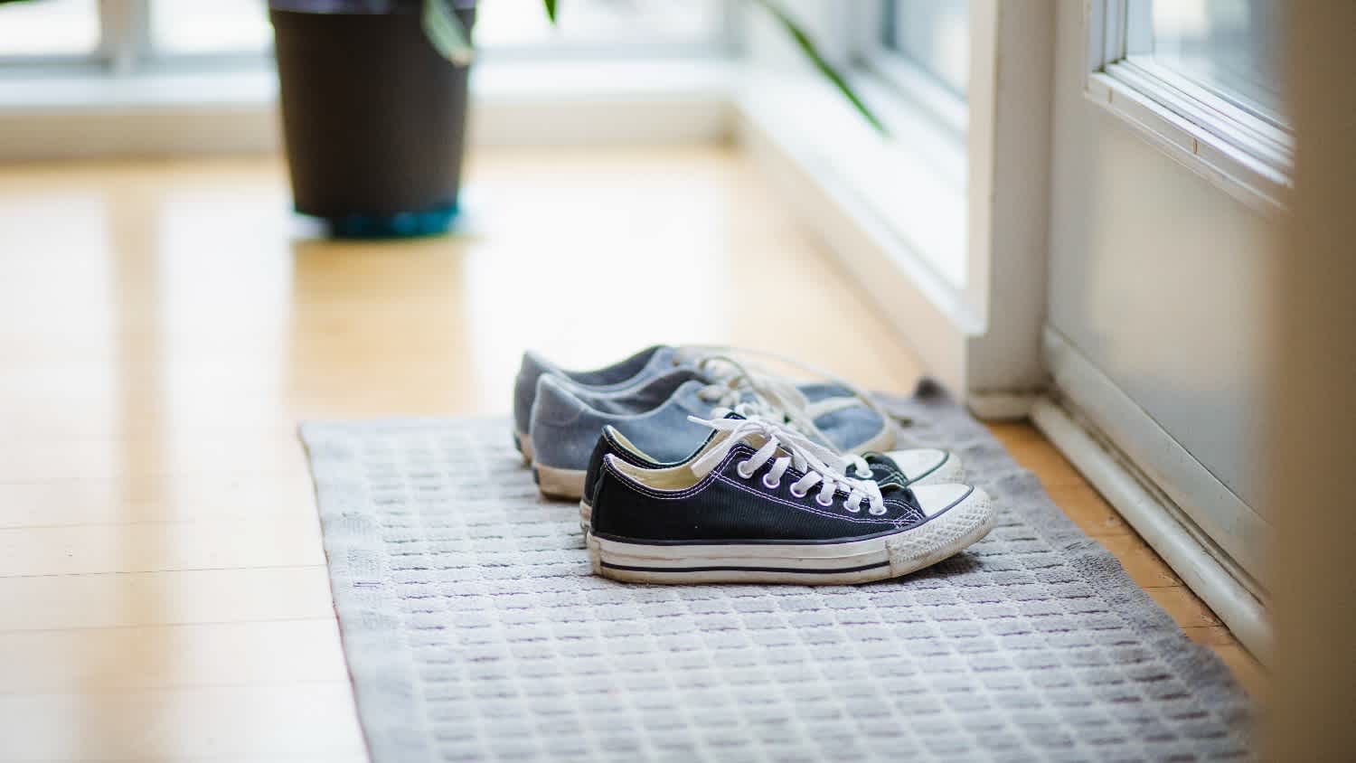 pair of shoes out front door