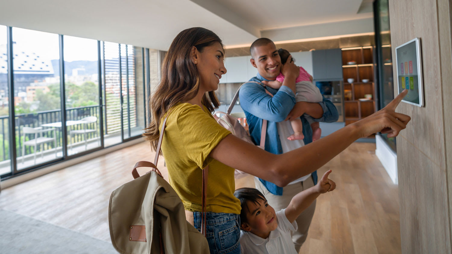 A family leaving the house while locking the doors from a digital tablet