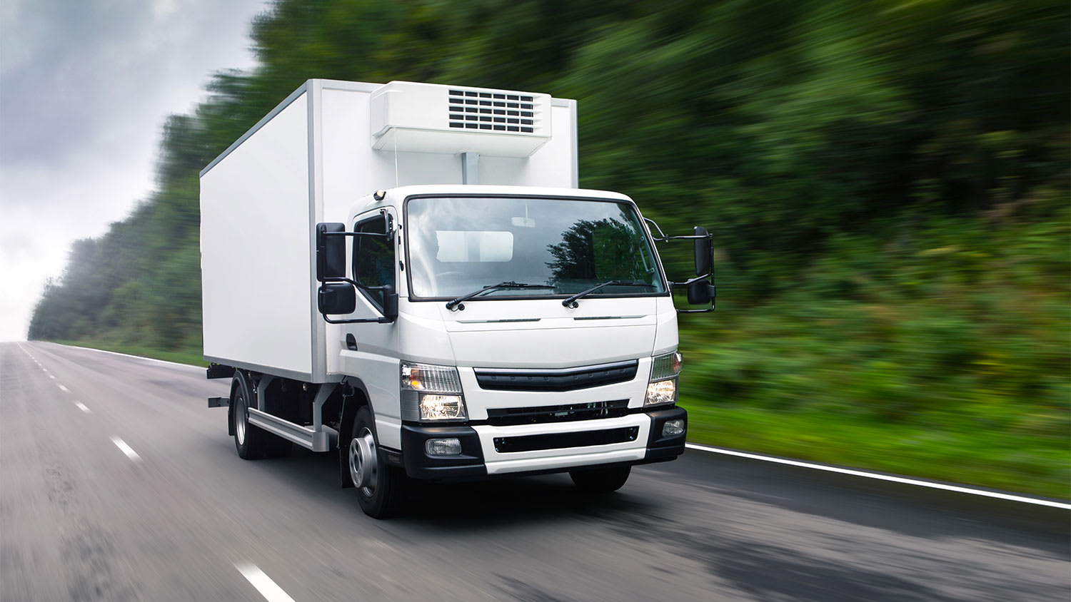 A moving truck on a highway