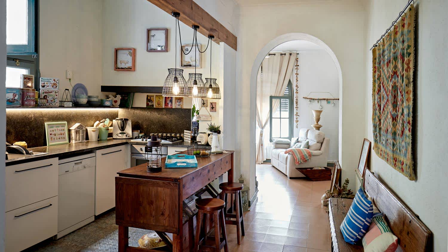 A rustic kitchen with a wooden counter