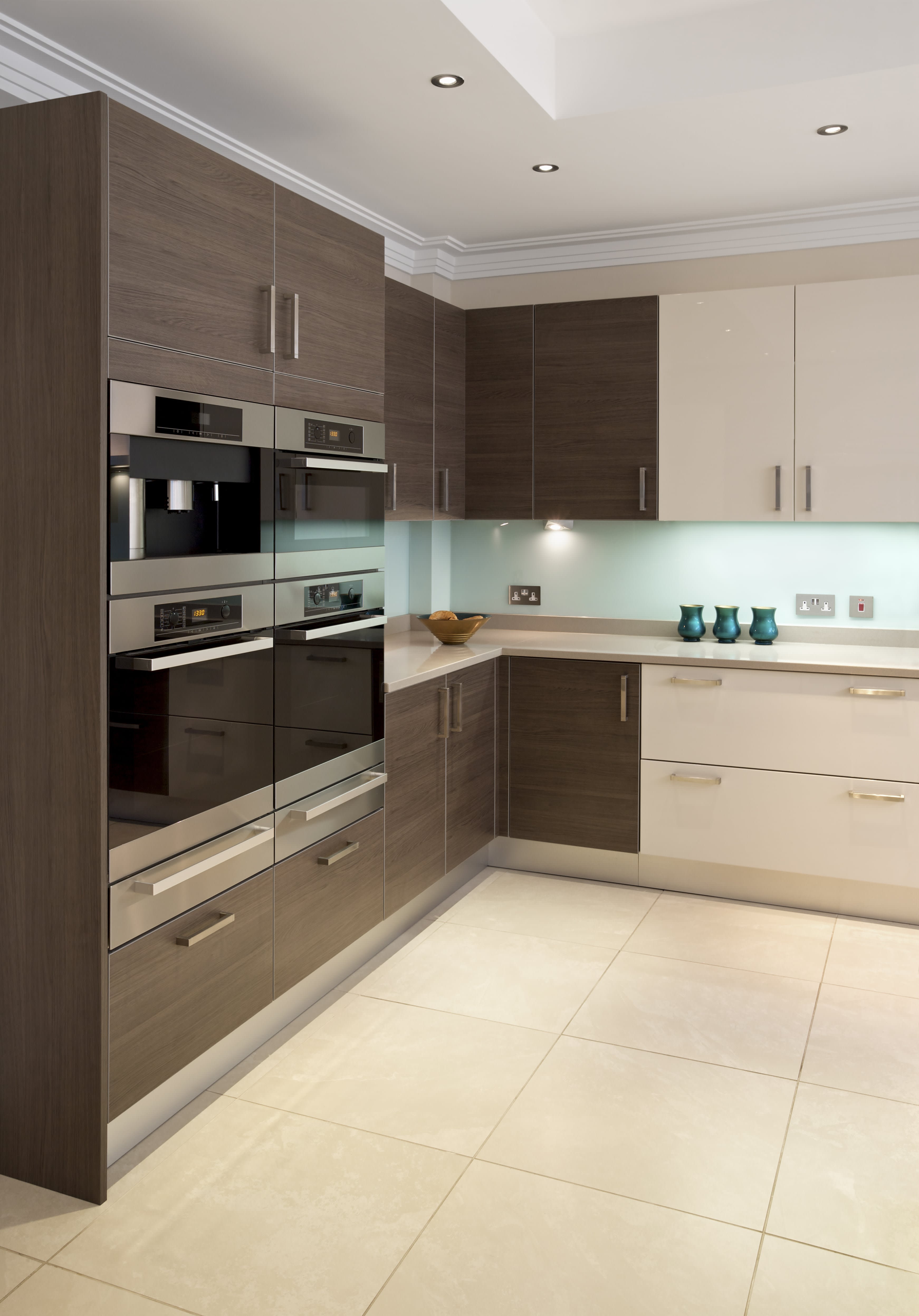 Walnut and beige two-toned cabinets in kitchen