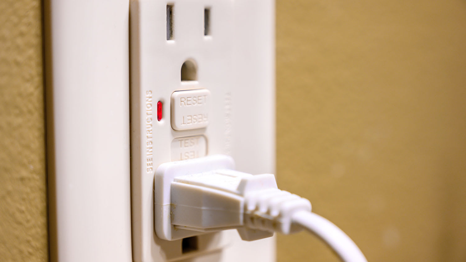 Closeup of a tripped GFCI outlet