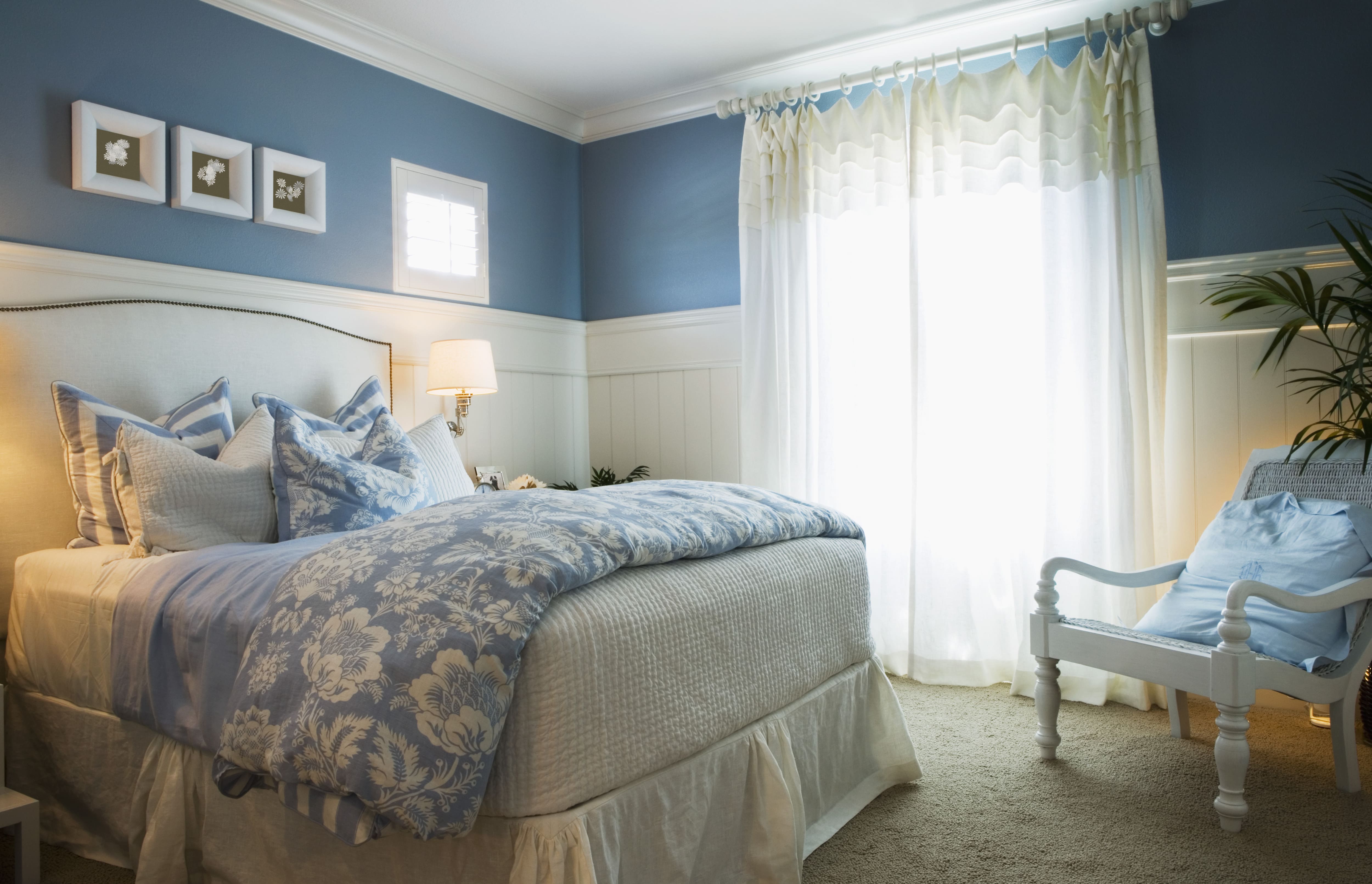 Blue and white bedroom with floral comforter