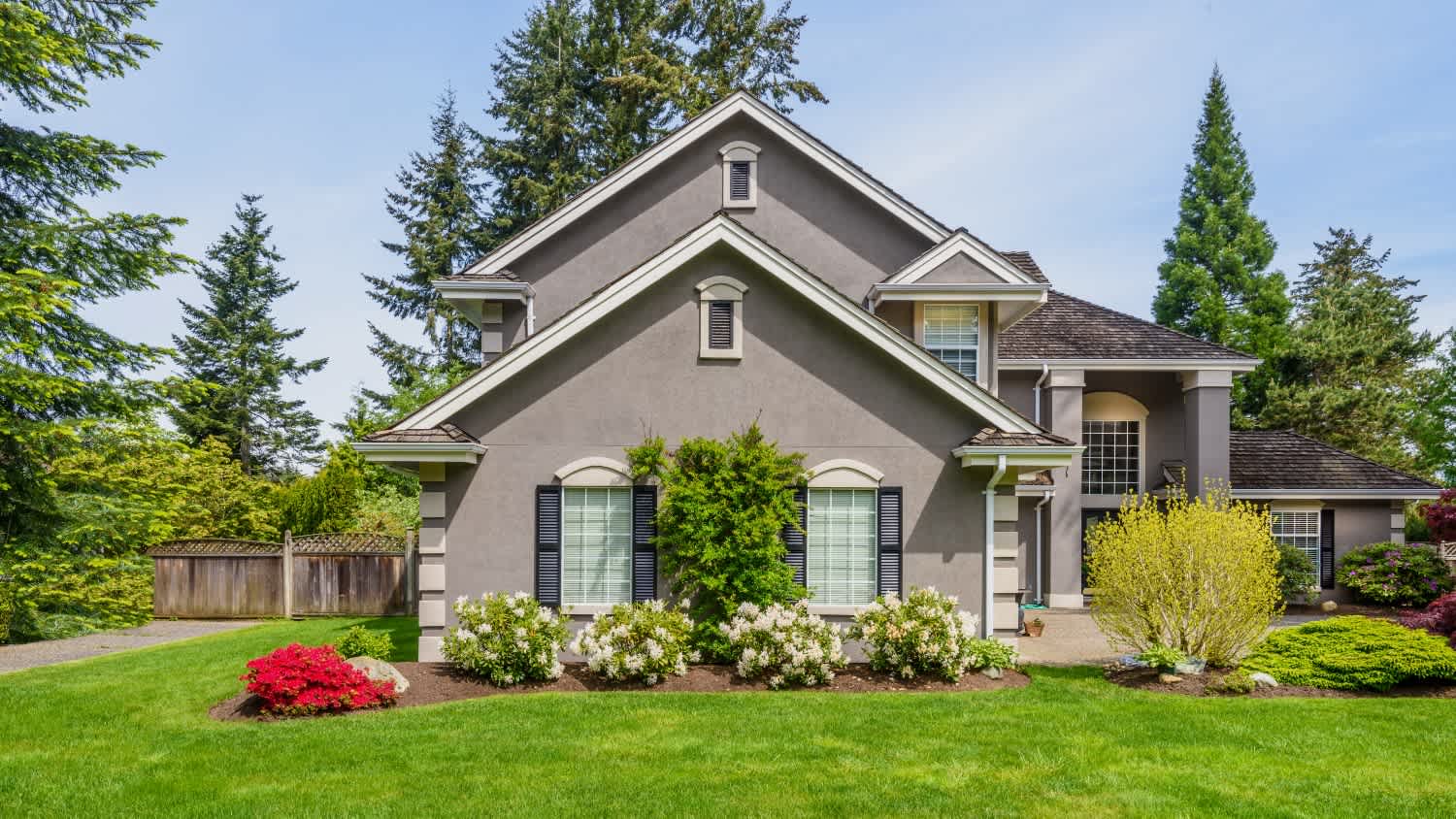 luxury grey house with landscaping