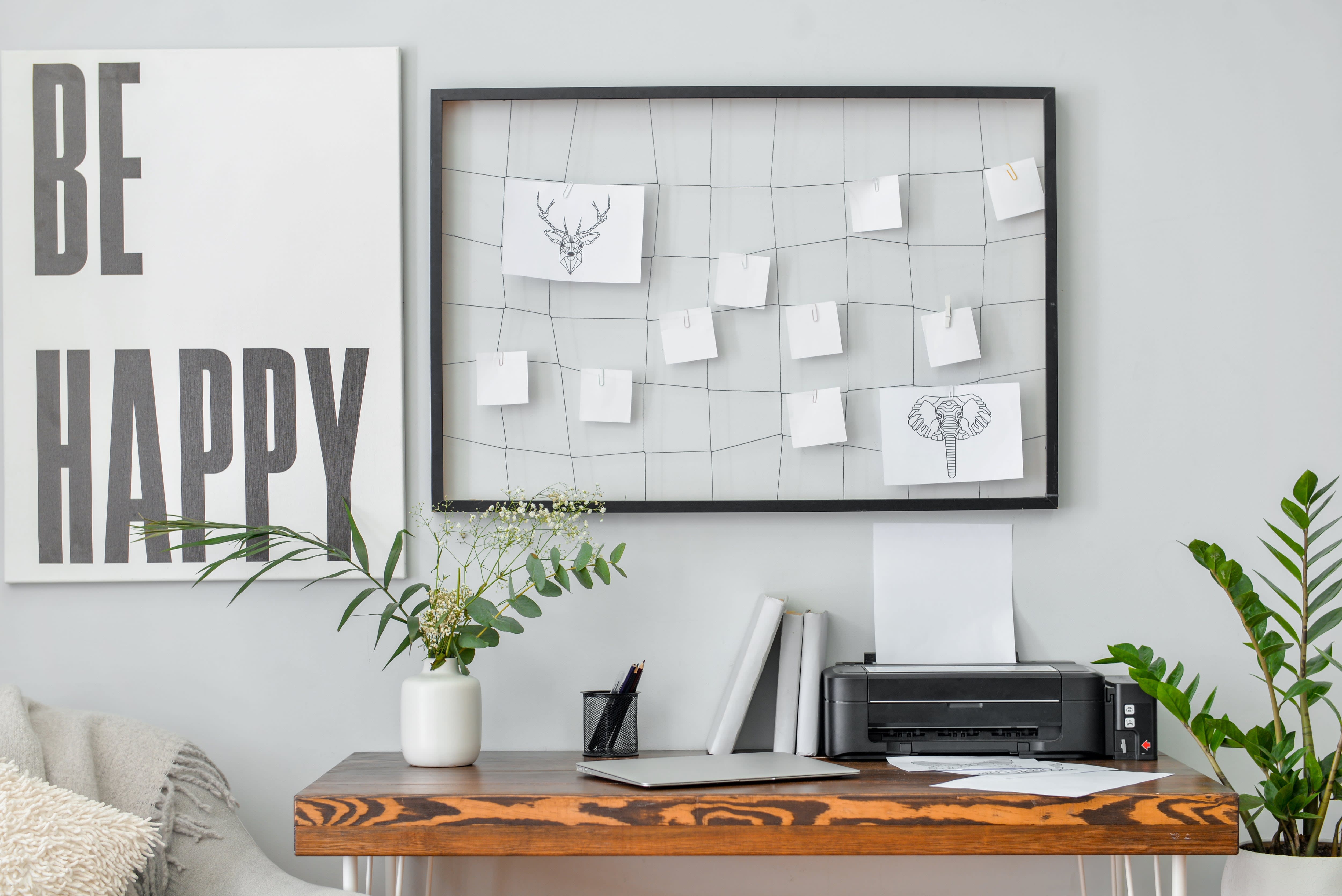 Home office decor featuring a framed motivational quote