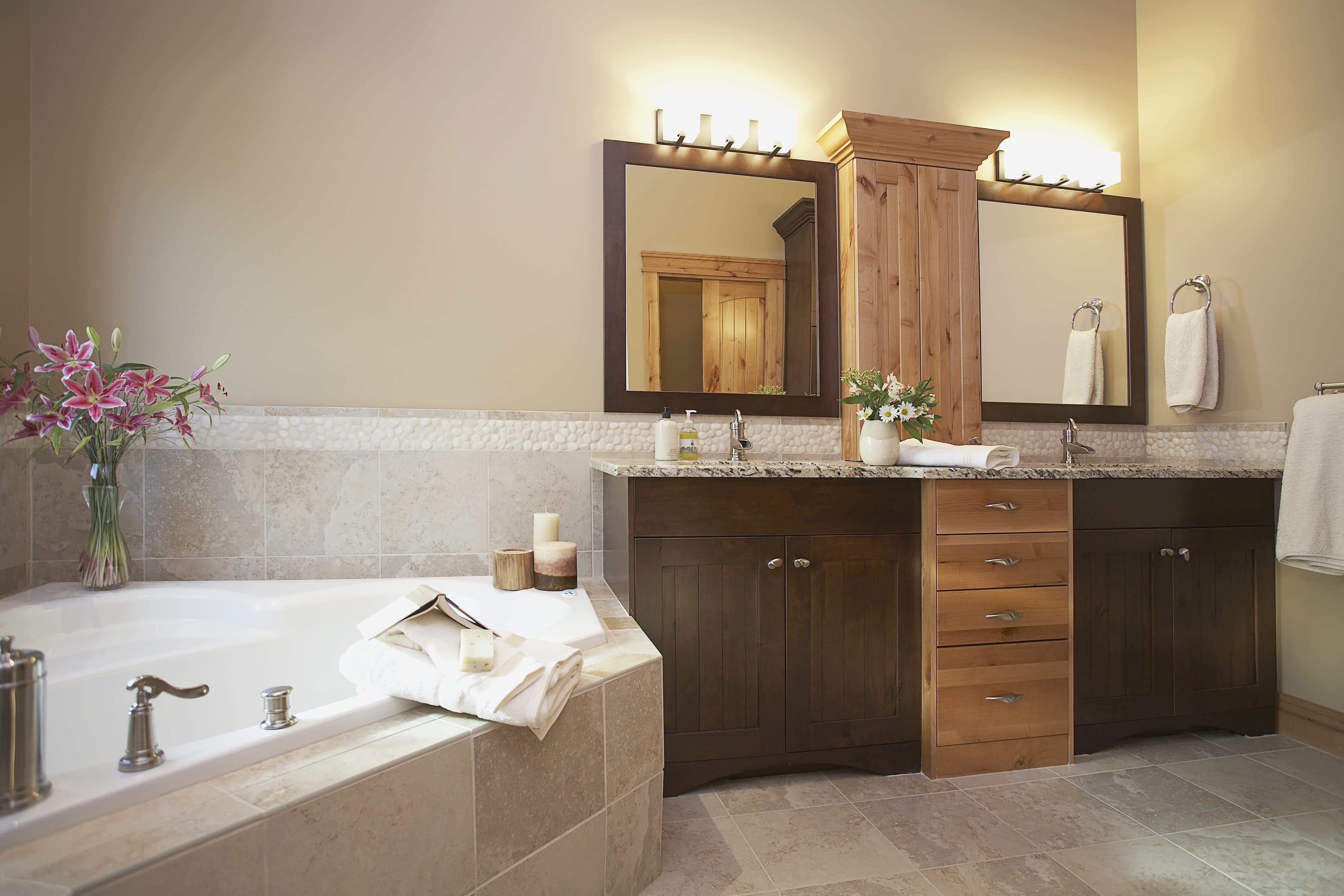 Double wooden mirrors hung above double vanity