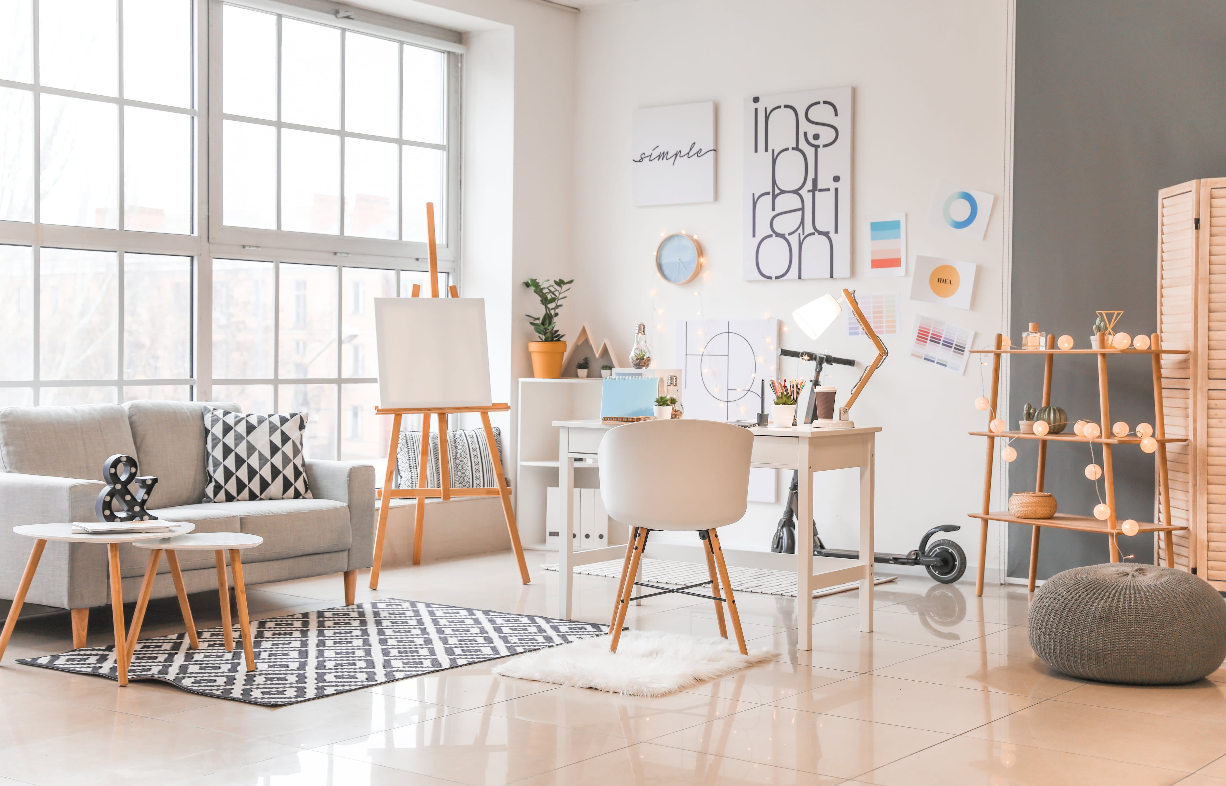 Modern home office with inspirational canvas art on the wall