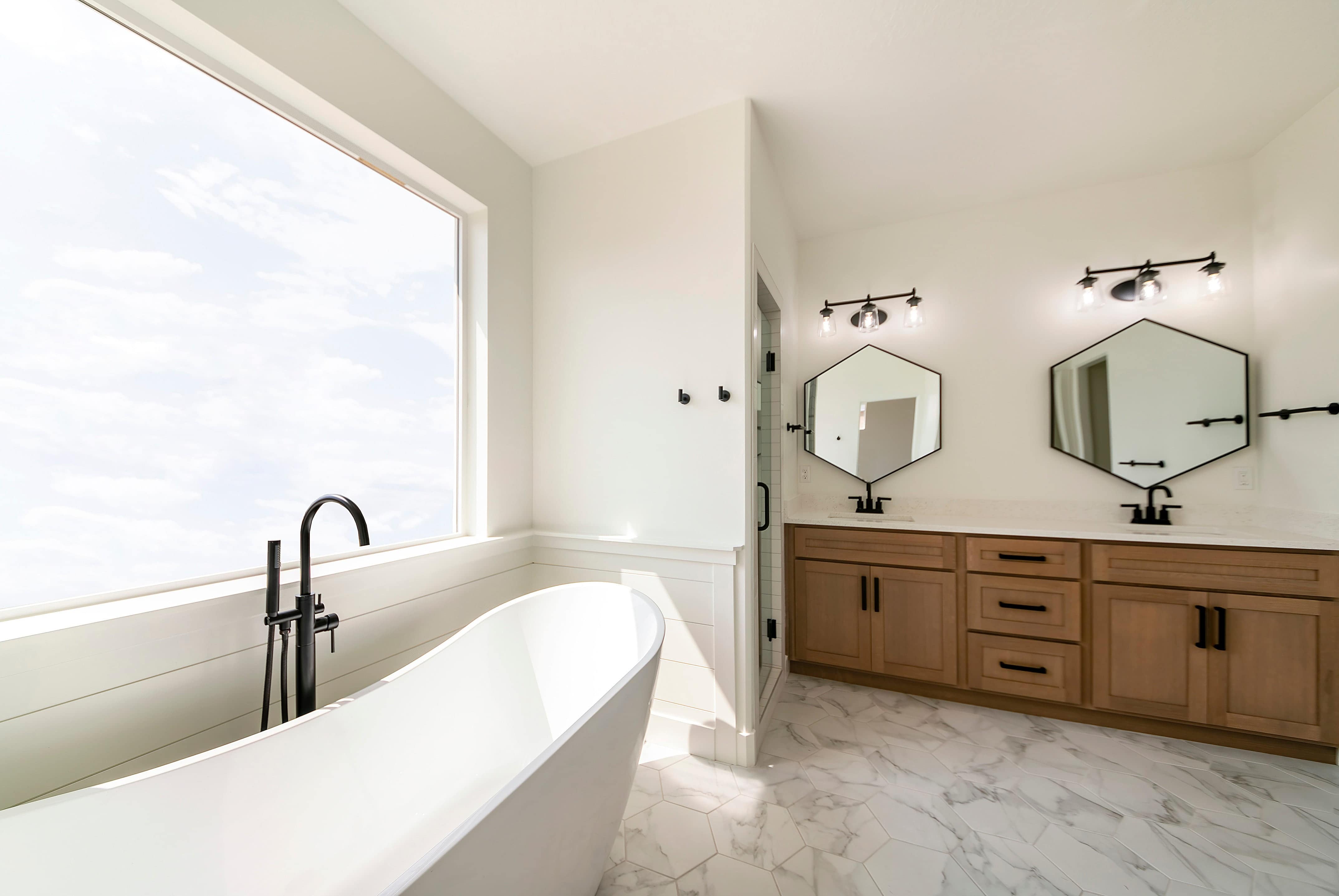Double hexagon mirrors in modern farmhouse bathroom