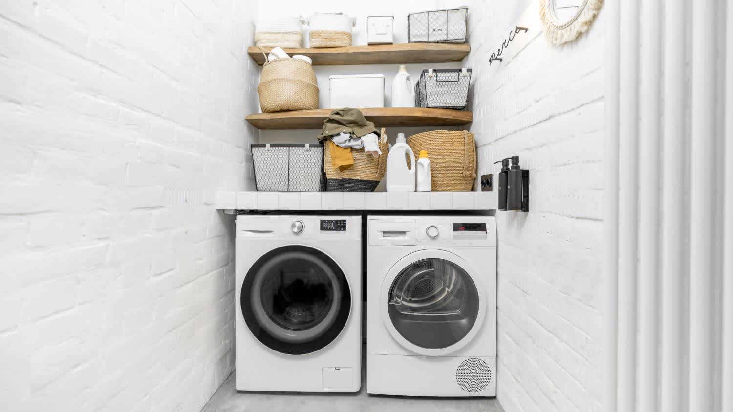 Domestic laundry room in white tones