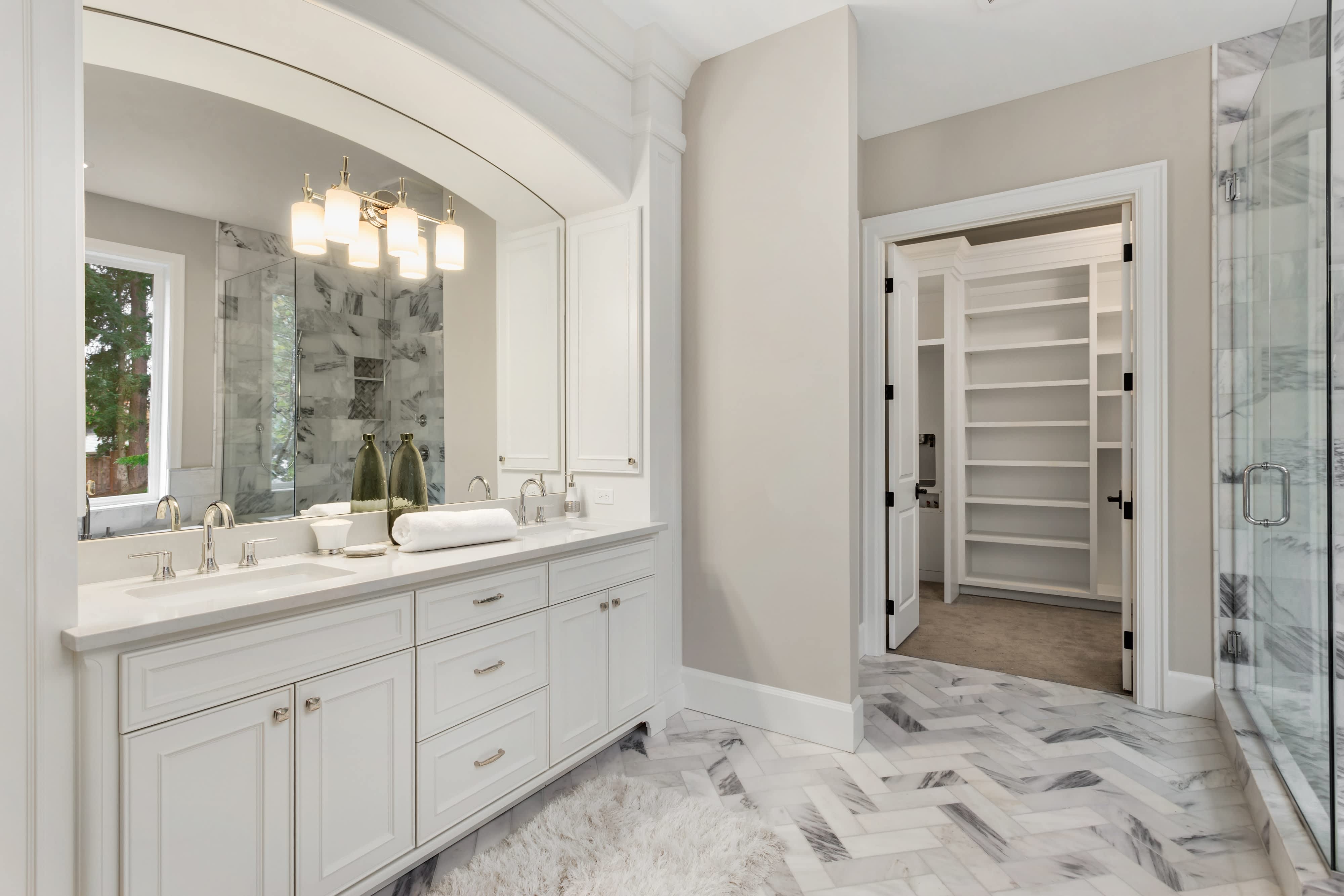 Large luxury bathroom with built-in mirror