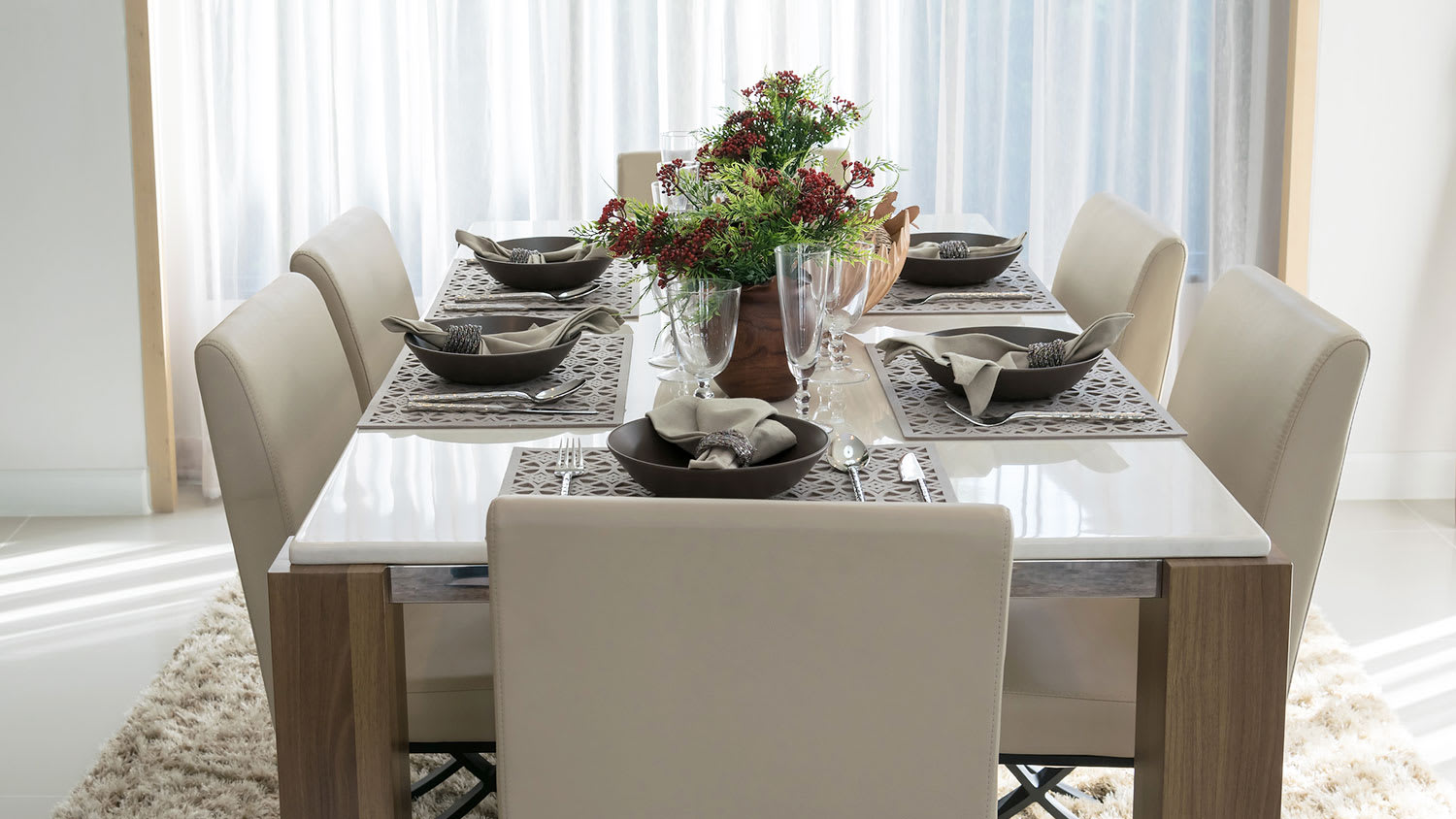 Elegant stone dining table with comfortable chairs