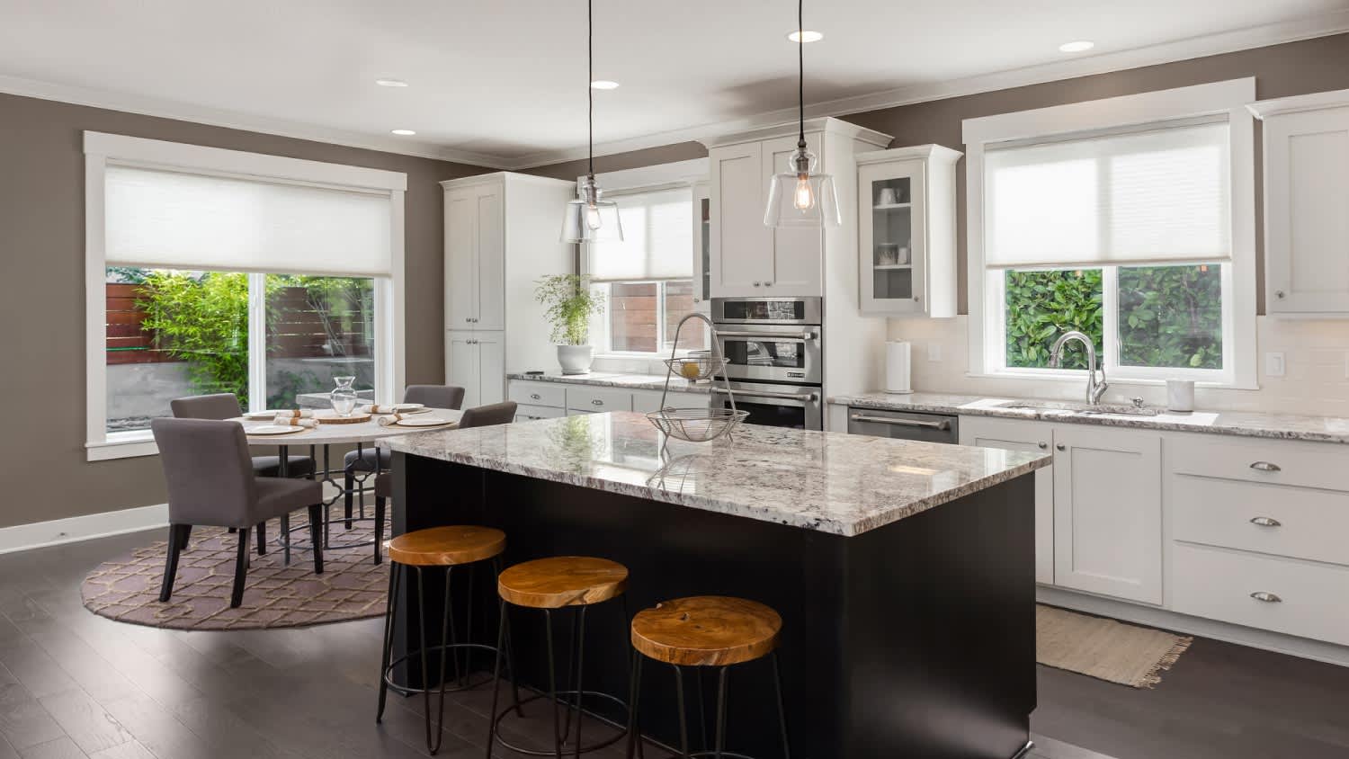 A kitchen in new luxury home with island