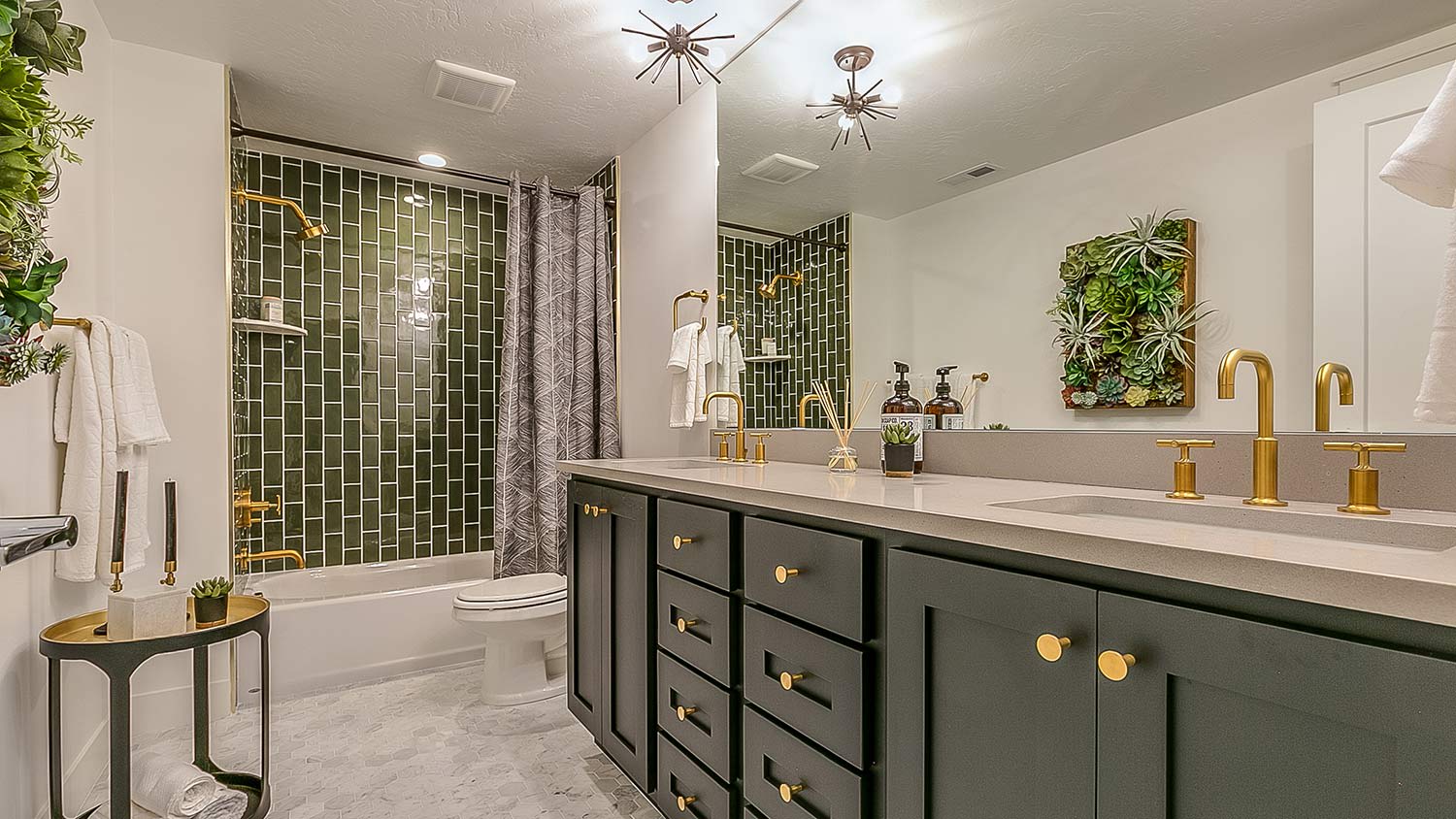 Green tile in bathroom with green cabinets