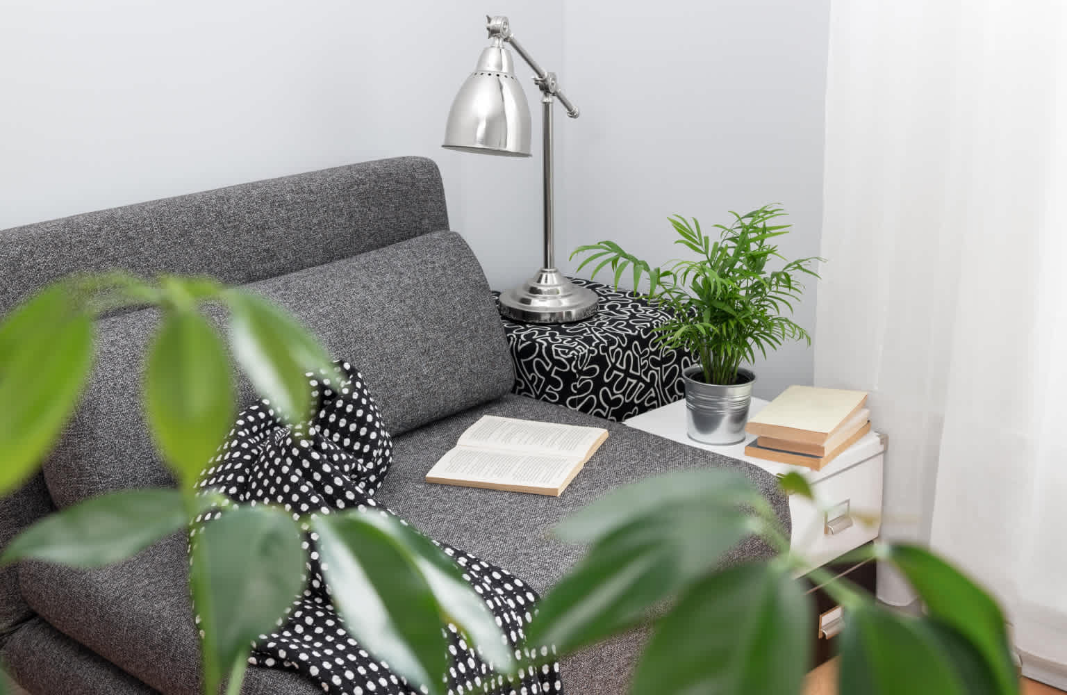 bedroom corner with sofa
