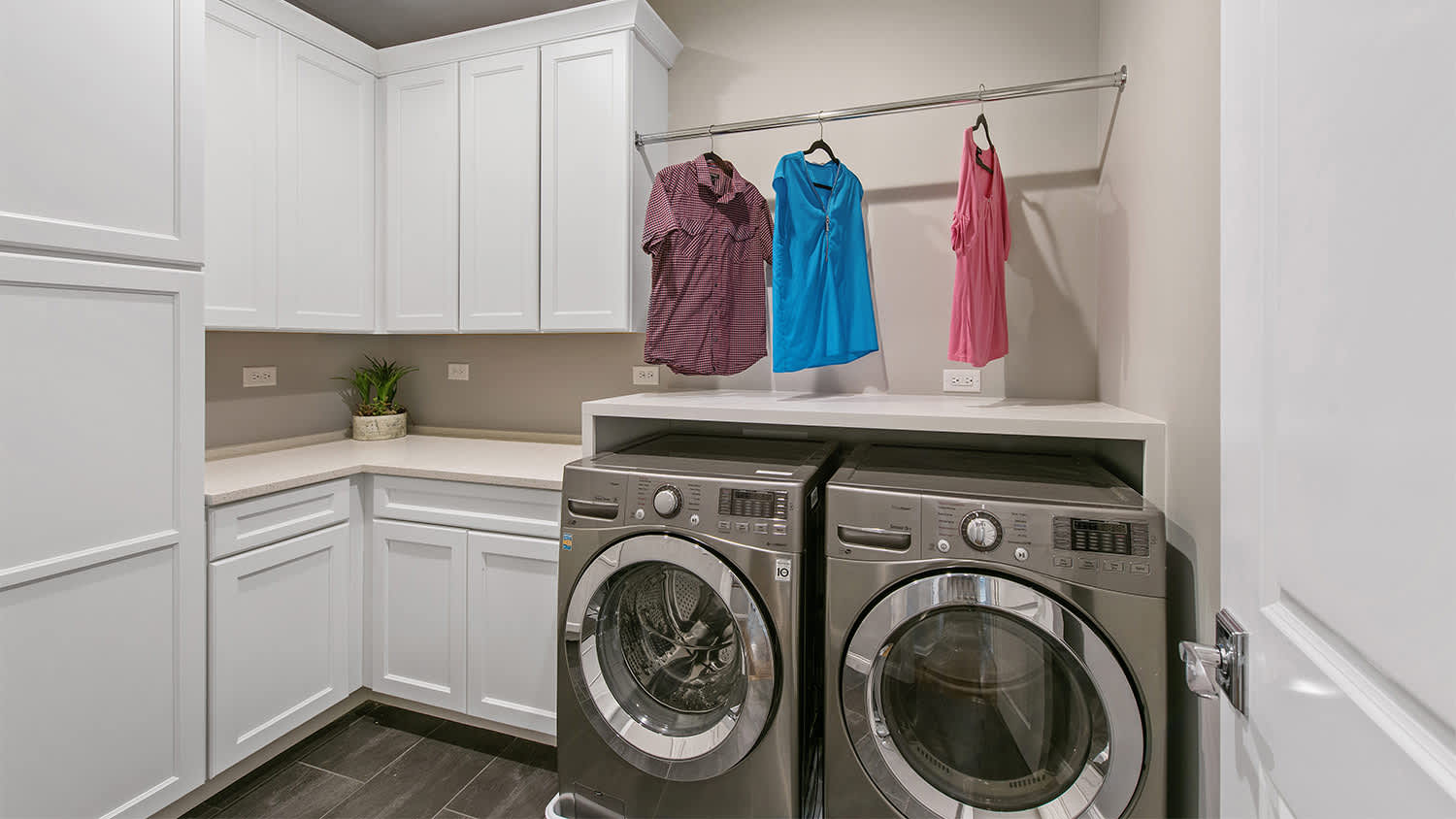 laundry room with clothes racks