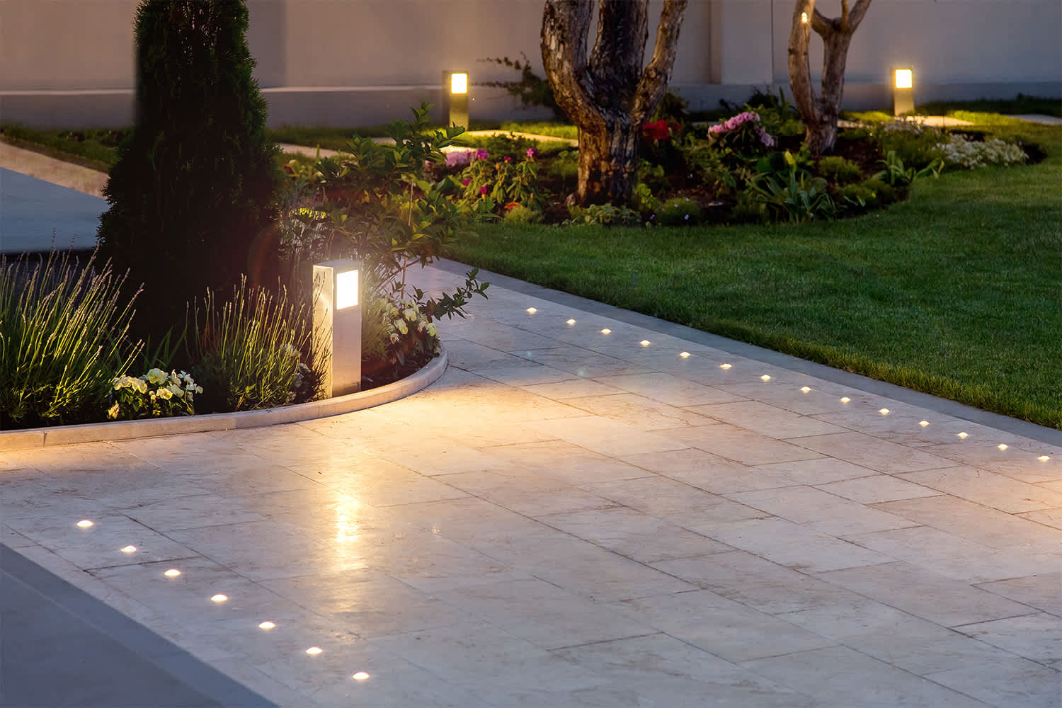 Modern outdoor lighting along entry path