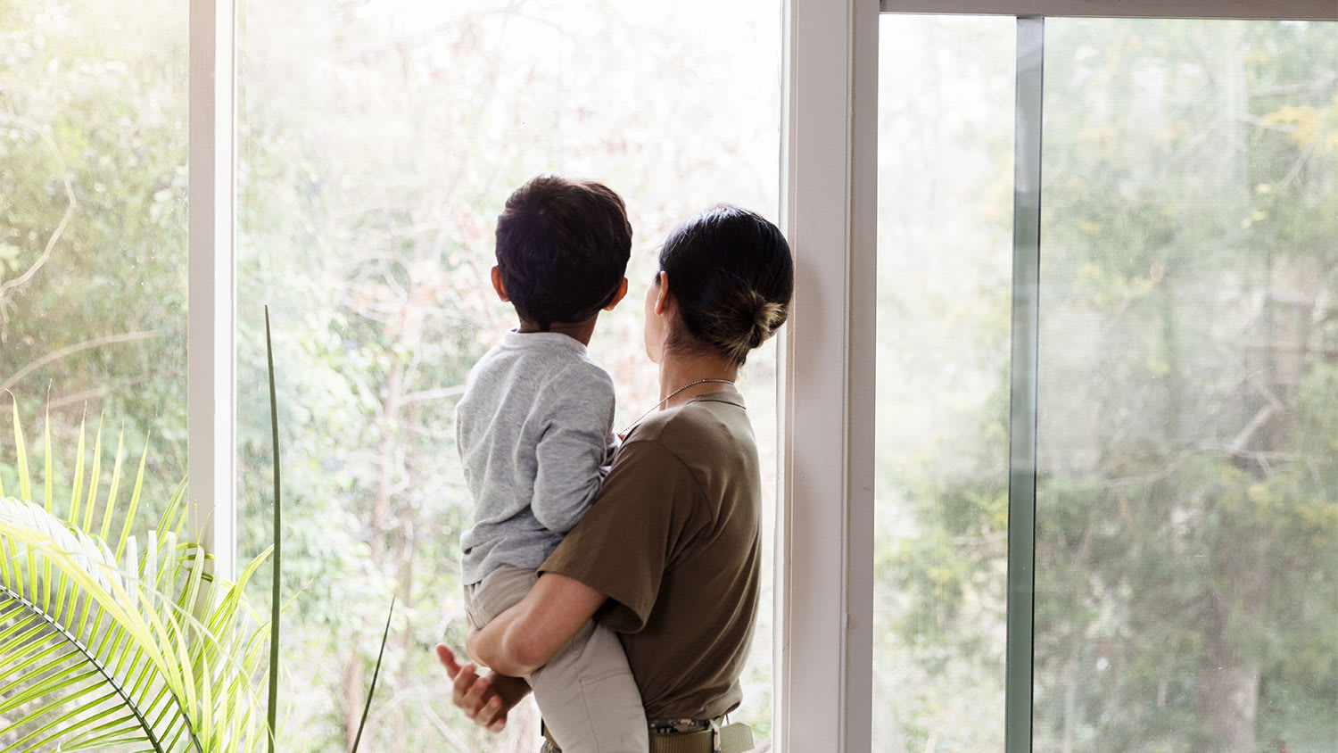 Child looking out through roof window