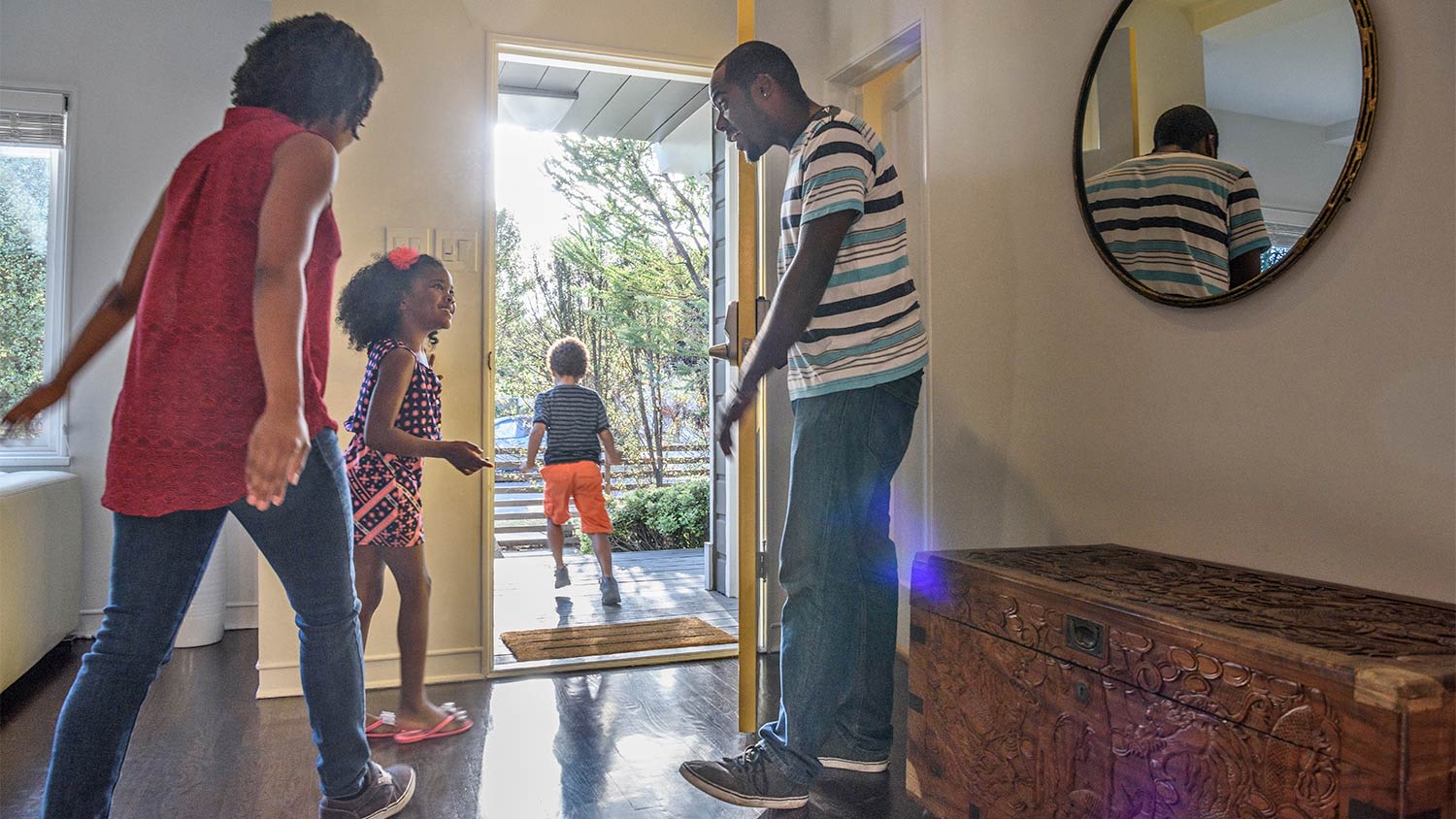 Family walking out of front door