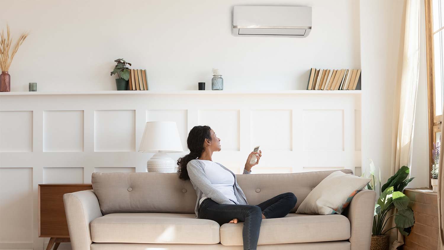 woman-home-air-conditioner