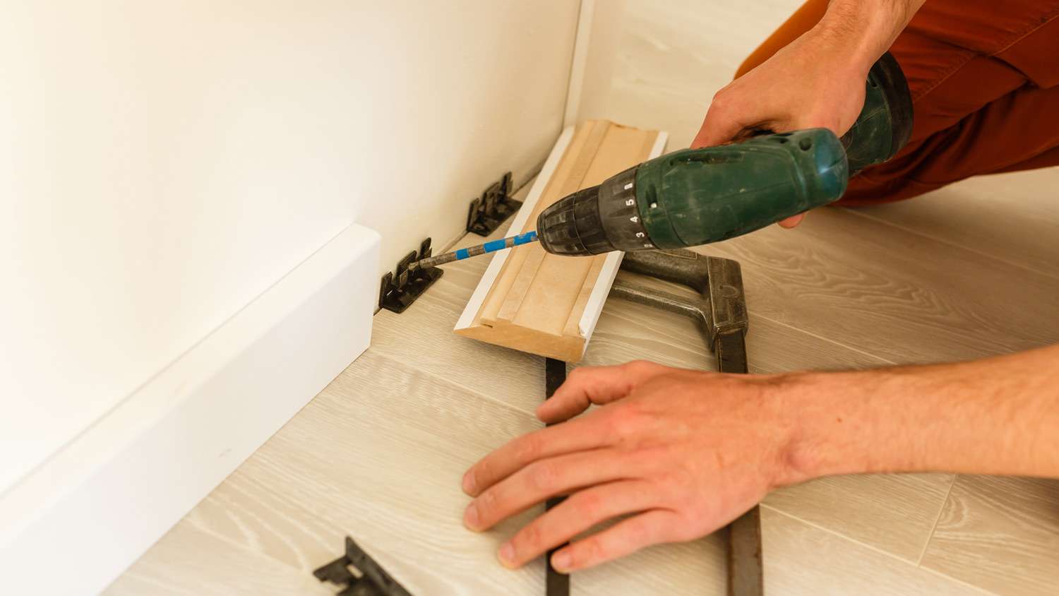 Installing new baseboard in a room