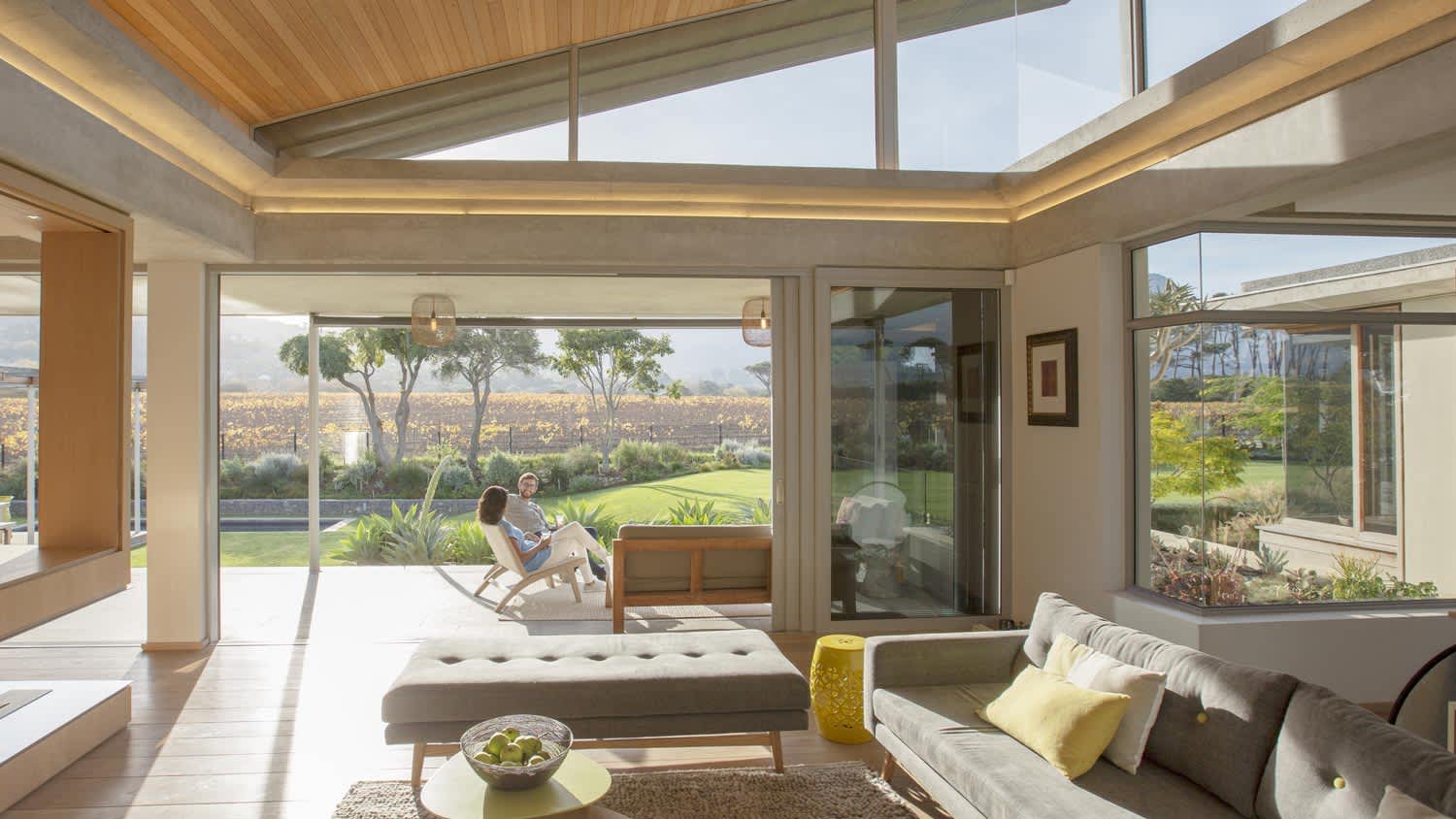 An open space living room with a shed ceiling