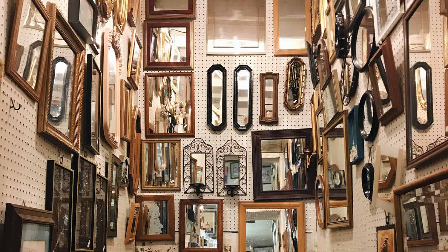 mirrors hanging on wall