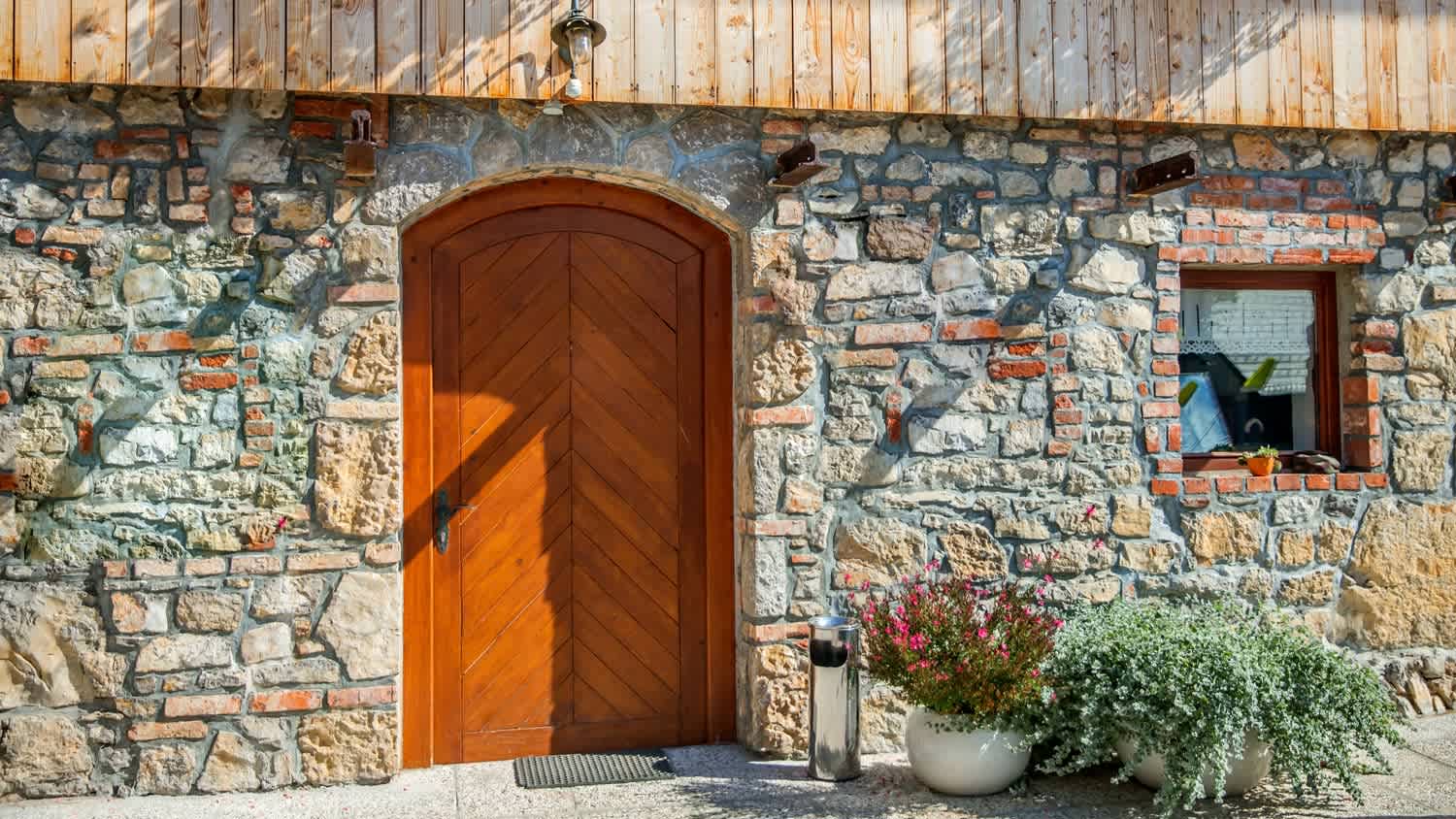 A wooden door facade of a house