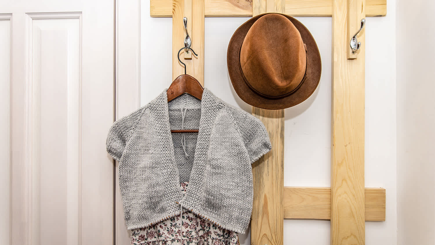 womans clothes hanging on hooks