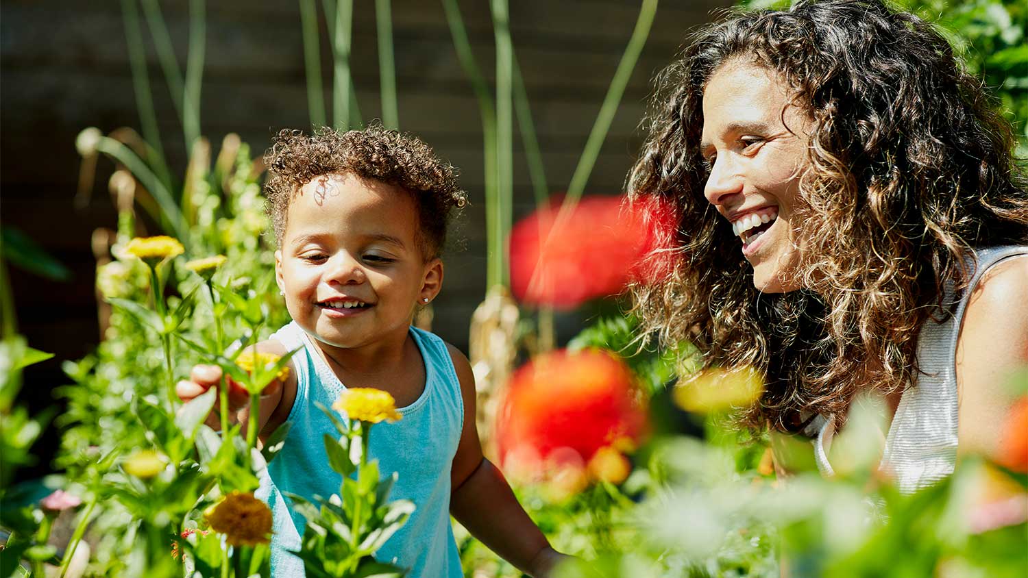 Mother and son in garden