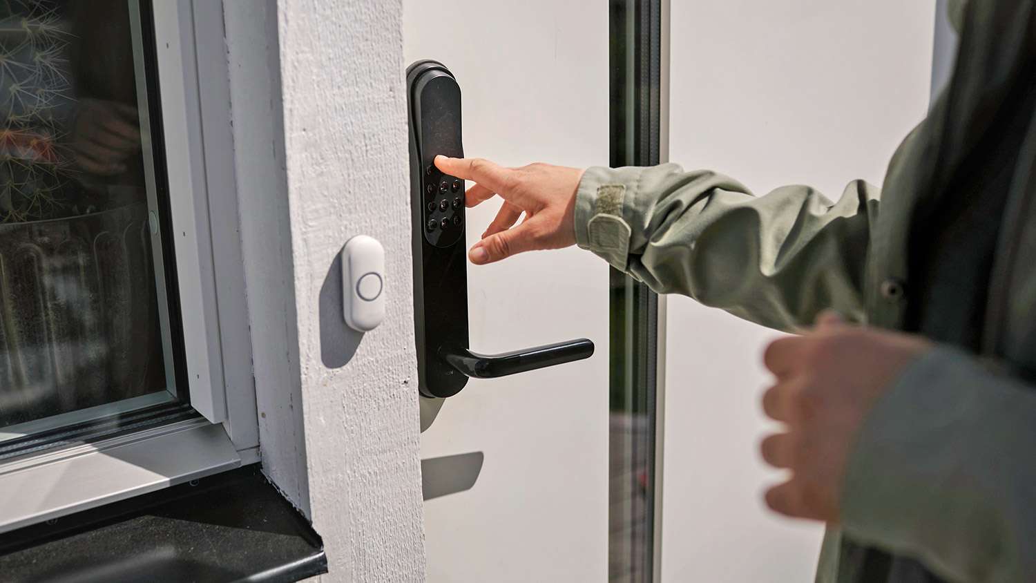 Woman using keyless door lock