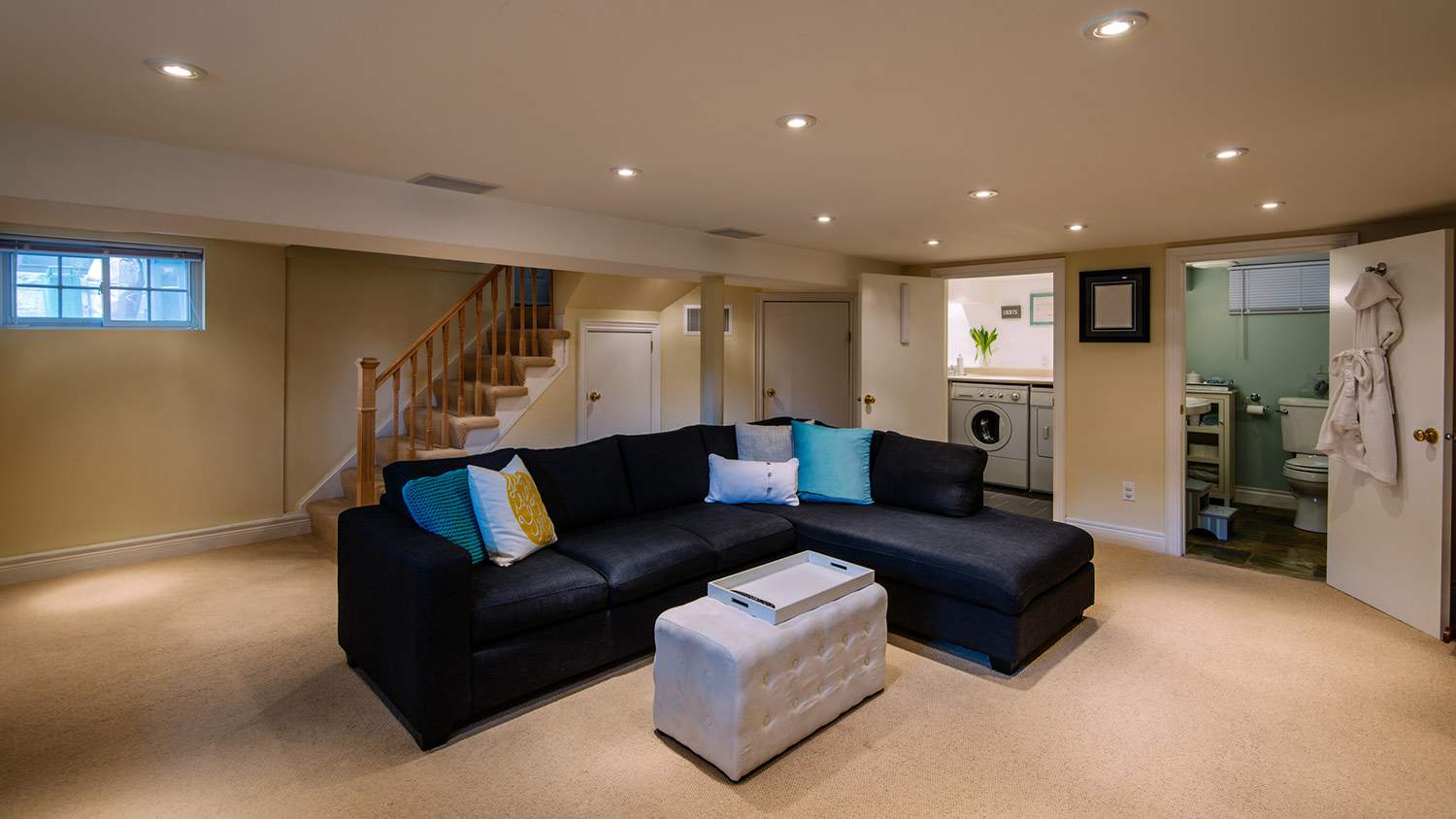 Finished basement with a living room and bathroom