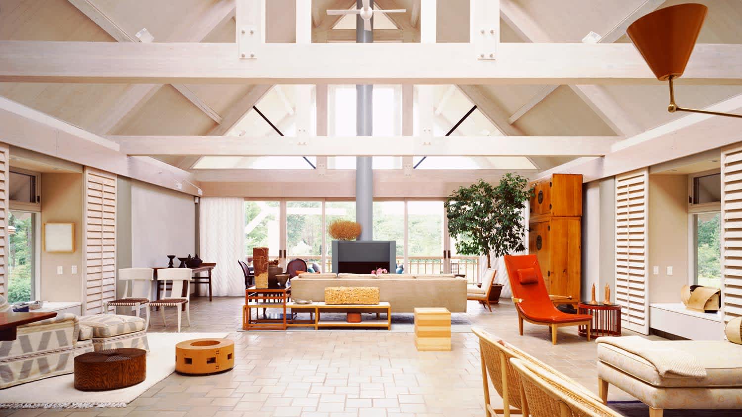 A lightfilled house with vaulted ceiling and eclectic furniture