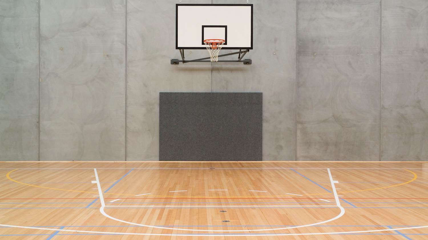 An indoor half-size basketball court