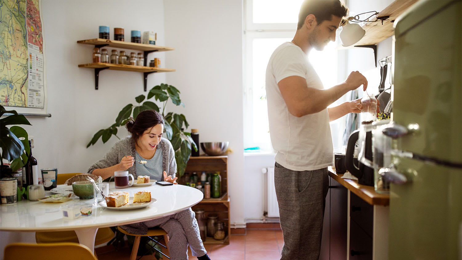 Couple in apartment kitchen