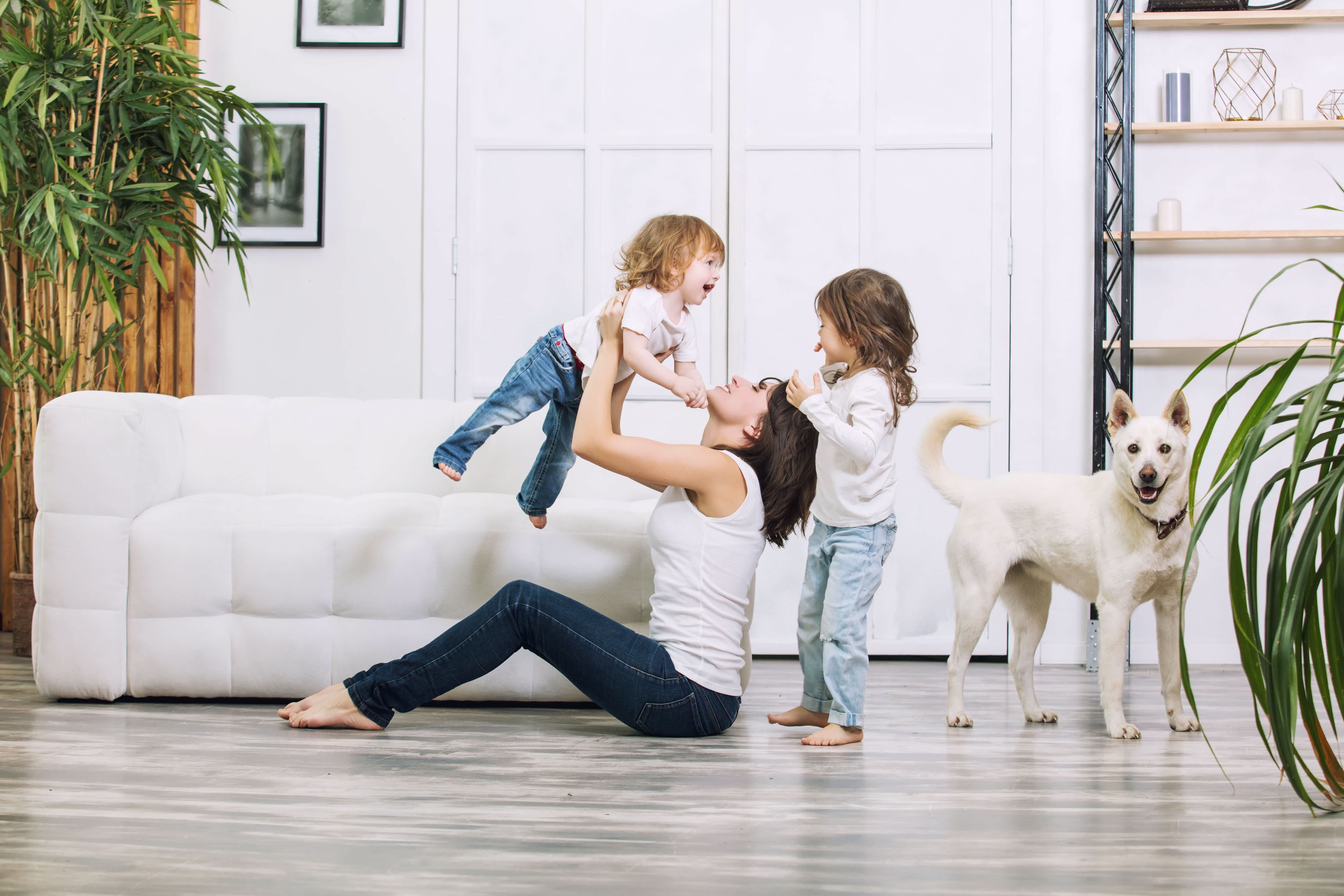 Family in white painted living room