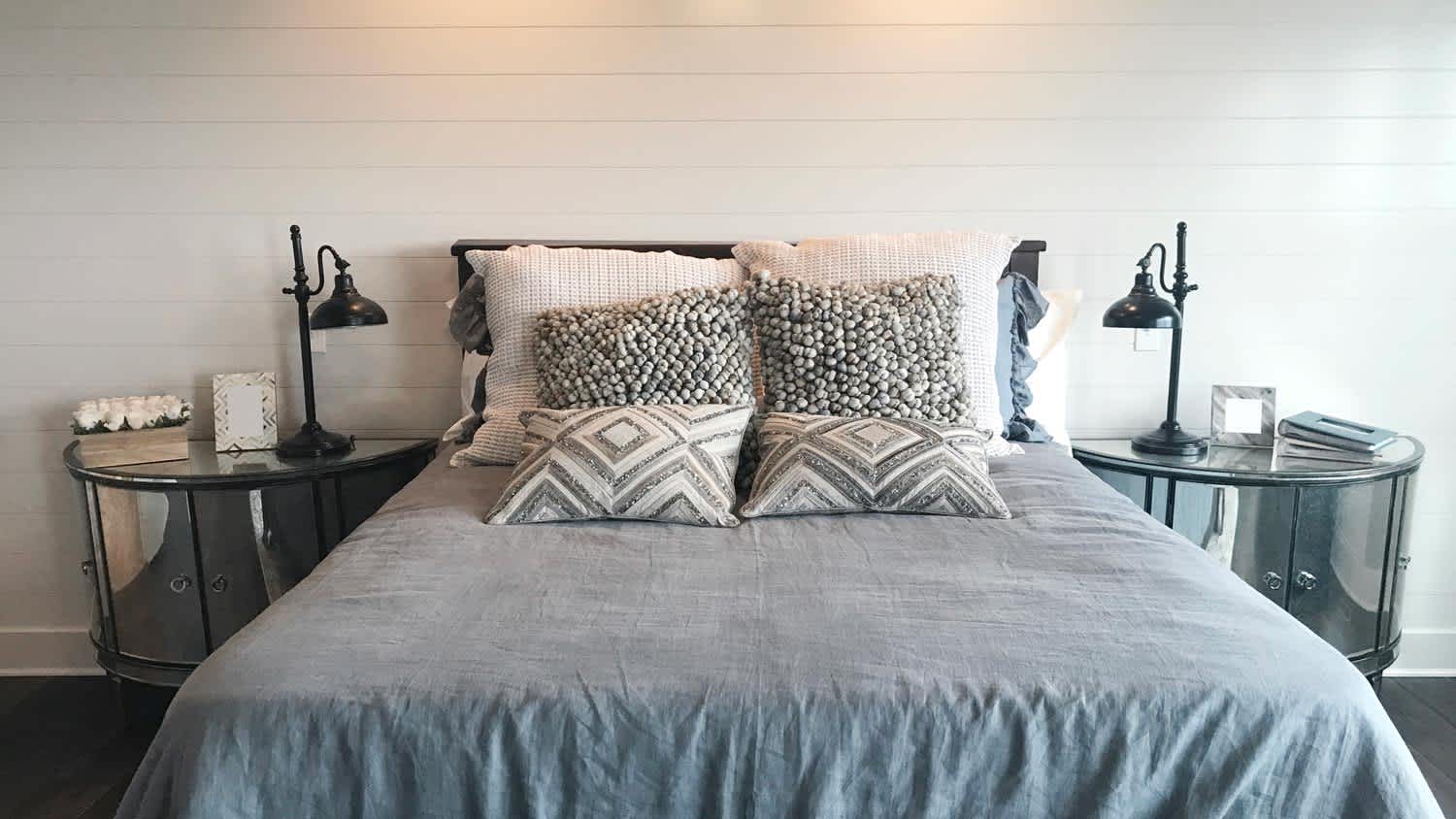 Bedroom in old house with shiplap walls