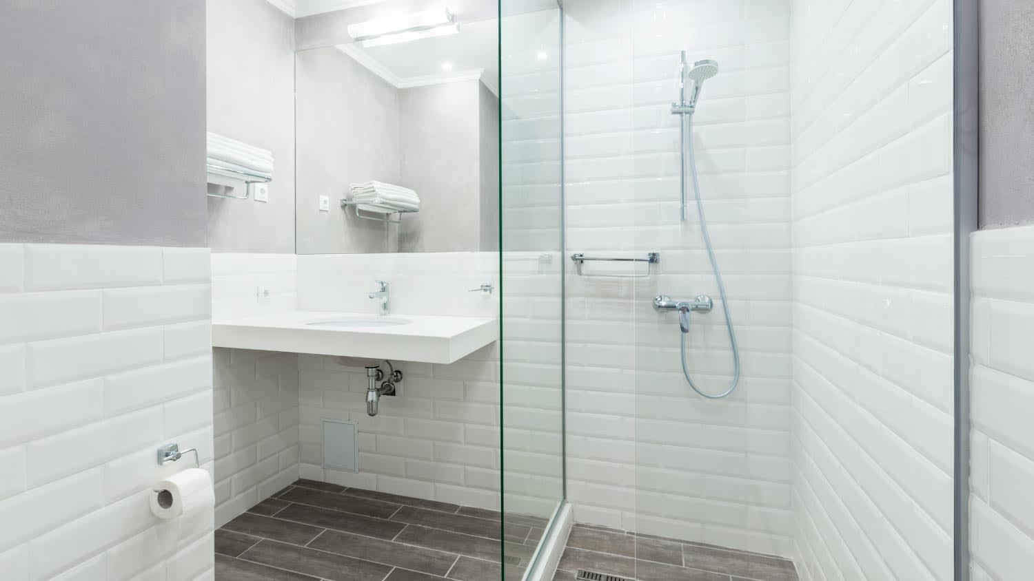 Modern bathroom with large mirror