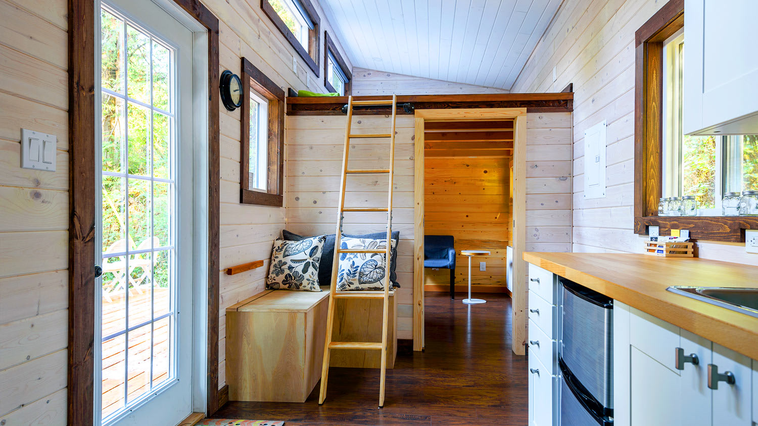 full tiny home interior kitchen and living area