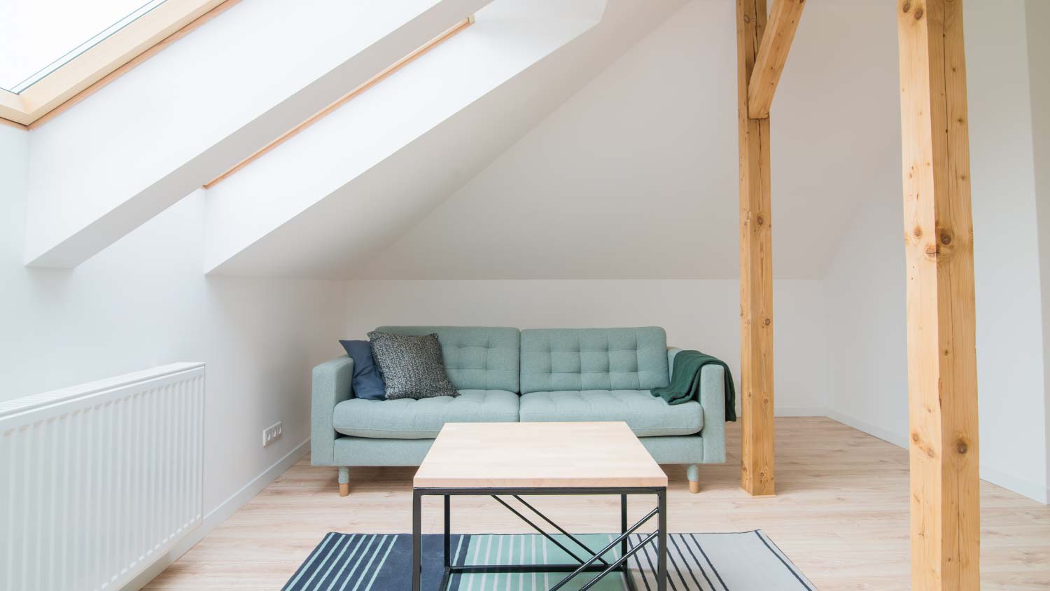 minimal living room with vaulted ceilings