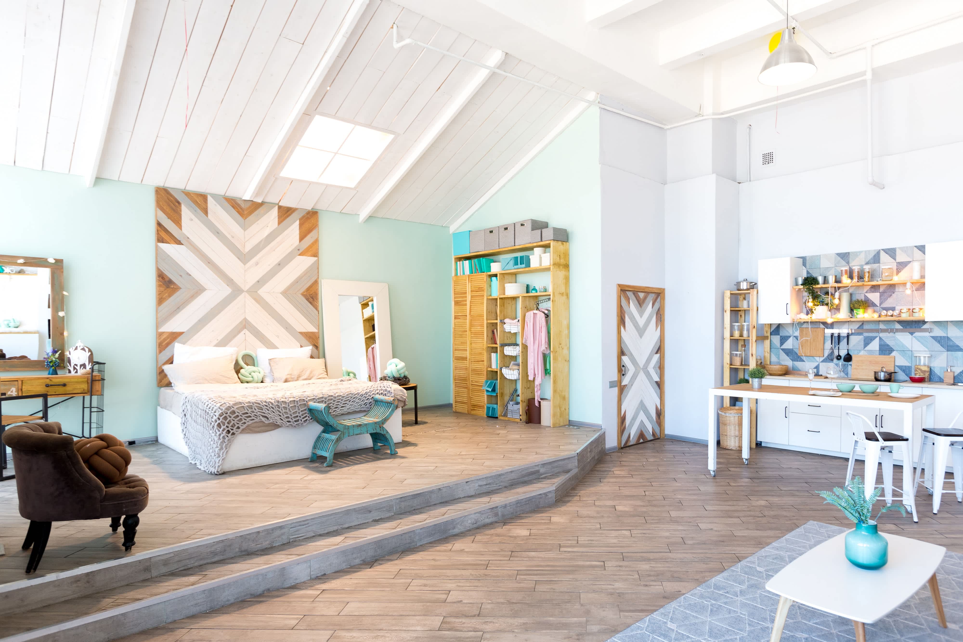 Artwork hung throughout studio apartment