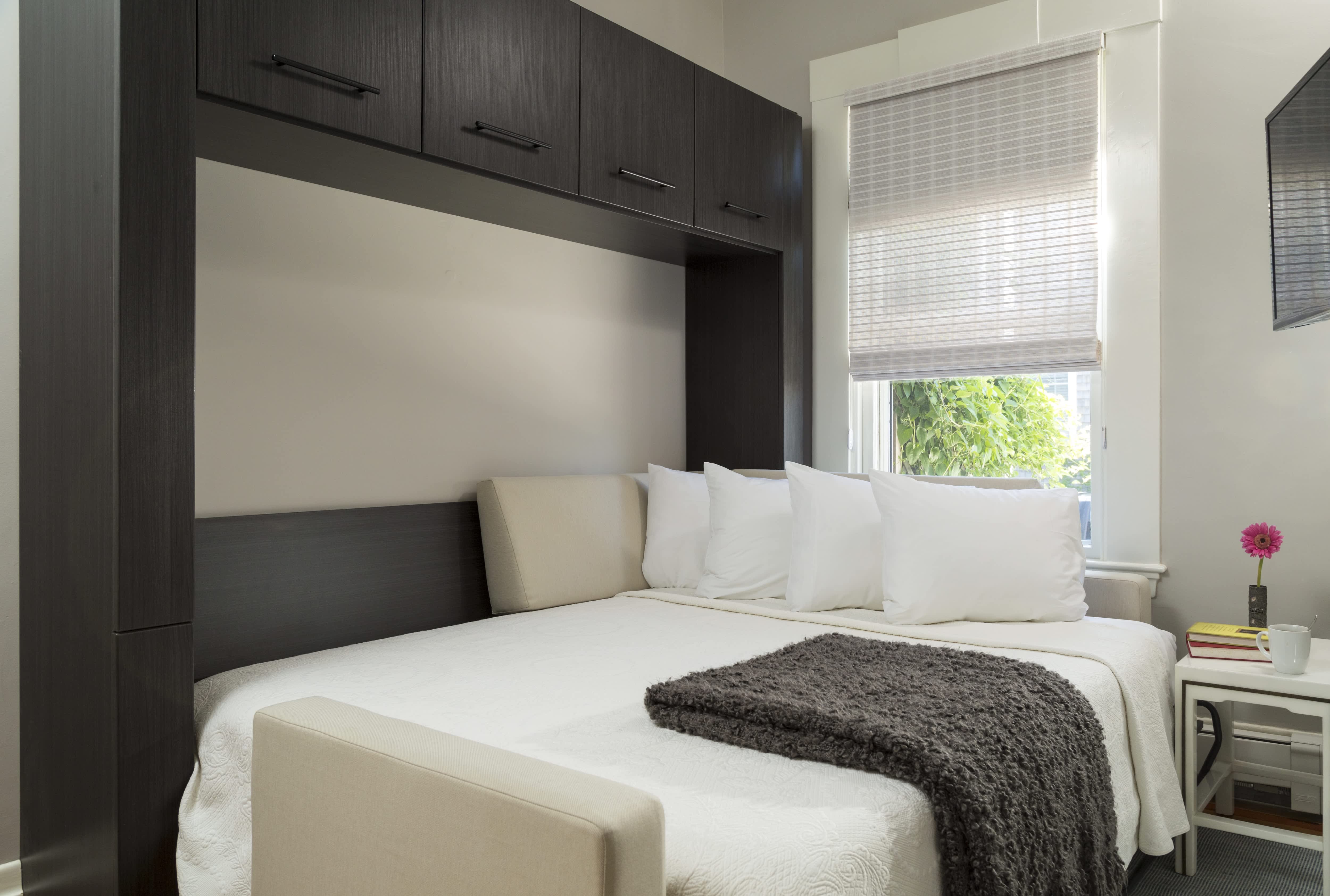 Fold up murphy bed in small apartment