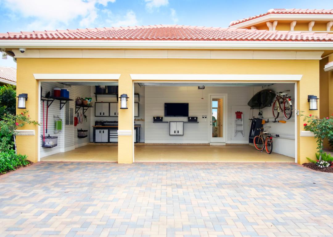 View of open yellow garage from the outside