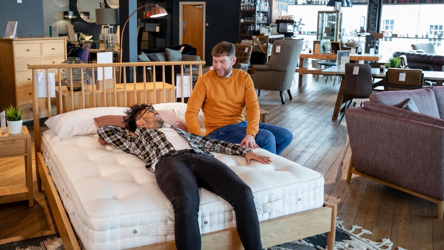 A couple buying a new mattress