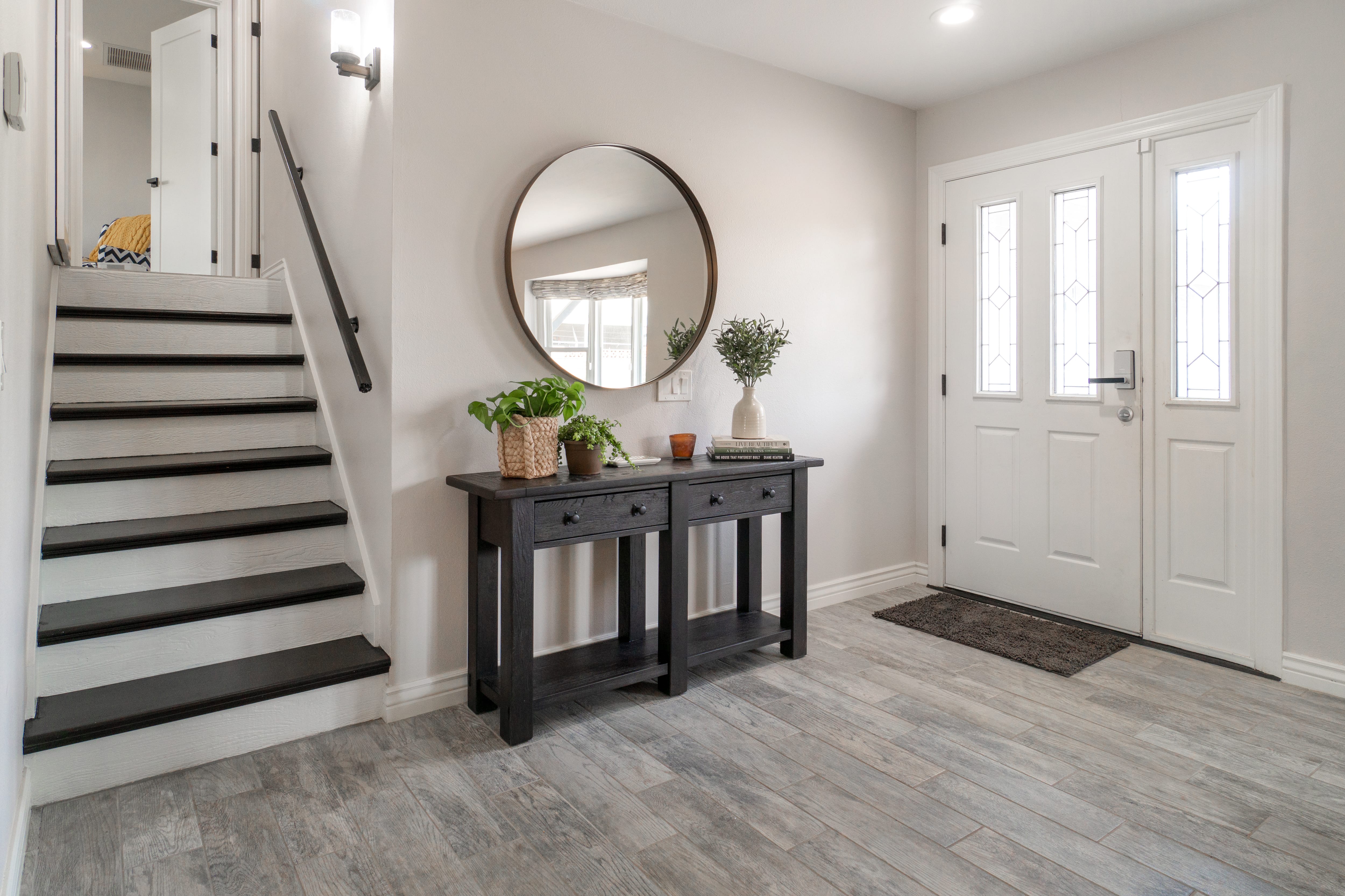 A clean and modern entryway with a rustic