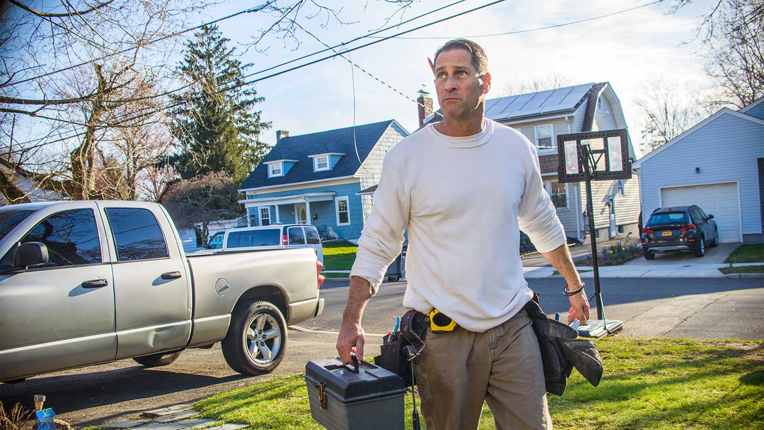 Plumber arriving at a home