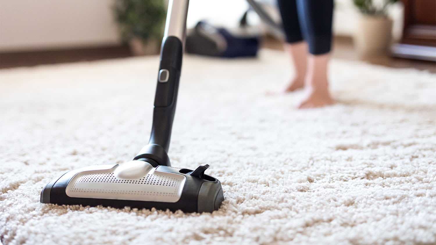 Vacuuming carpet
