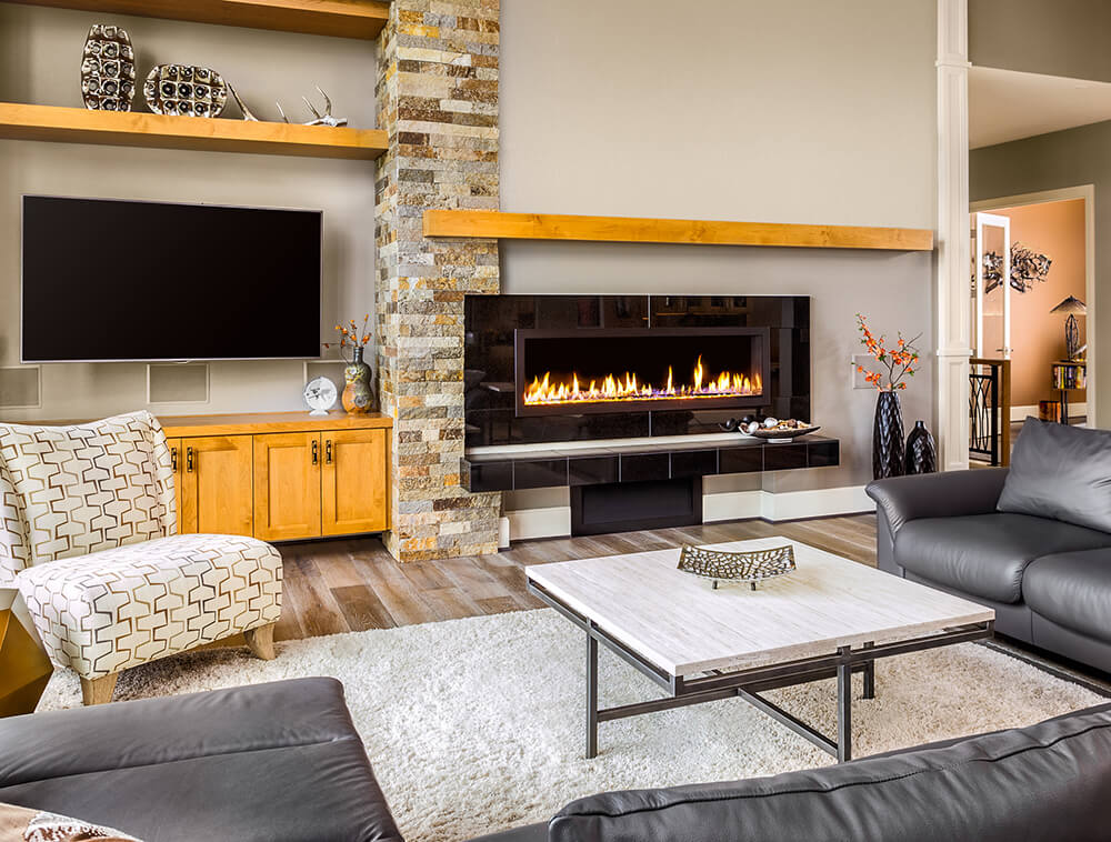 Large electric fireplace set in a bright modern living room