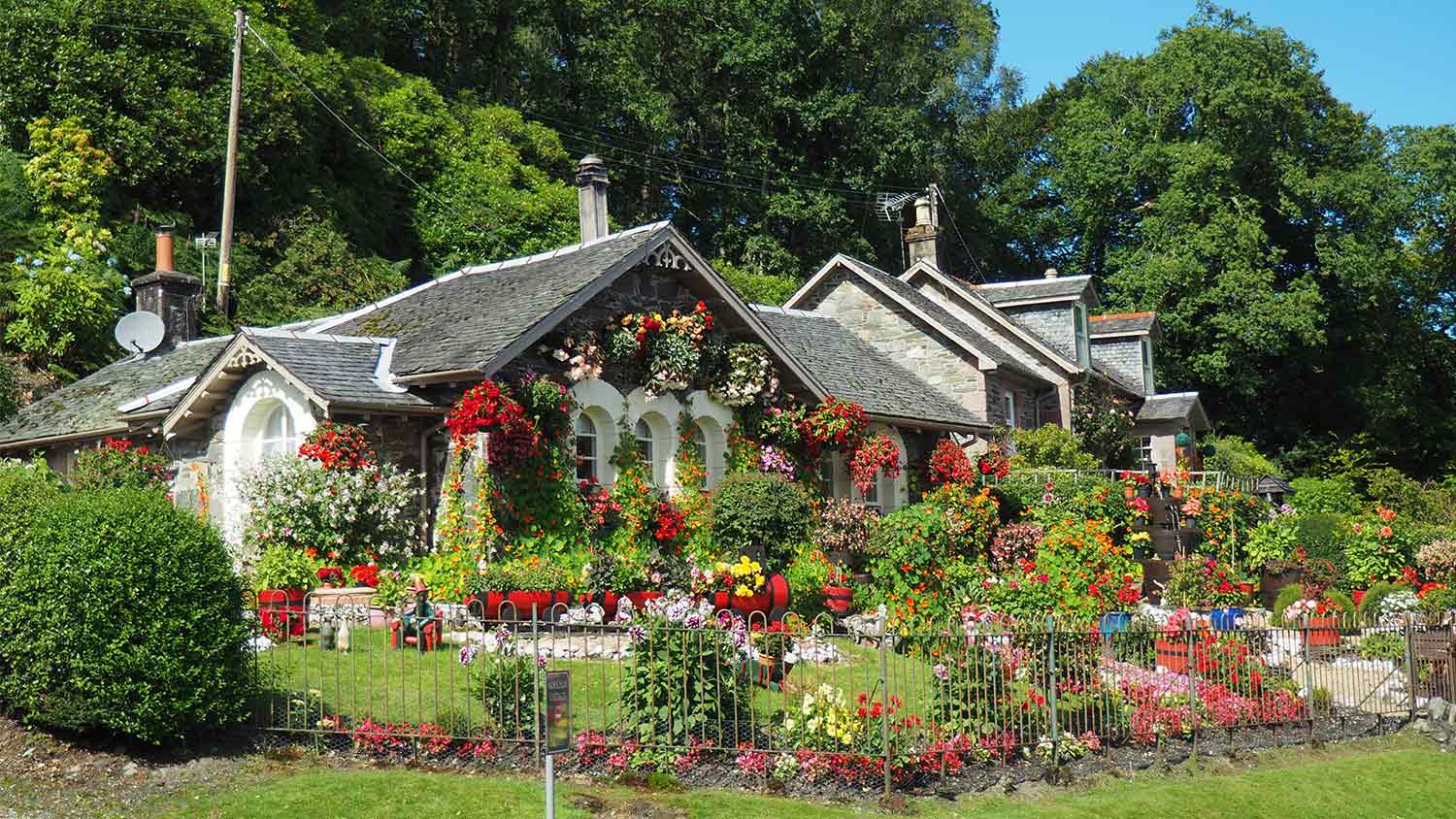 A historic home with an elaborate garden